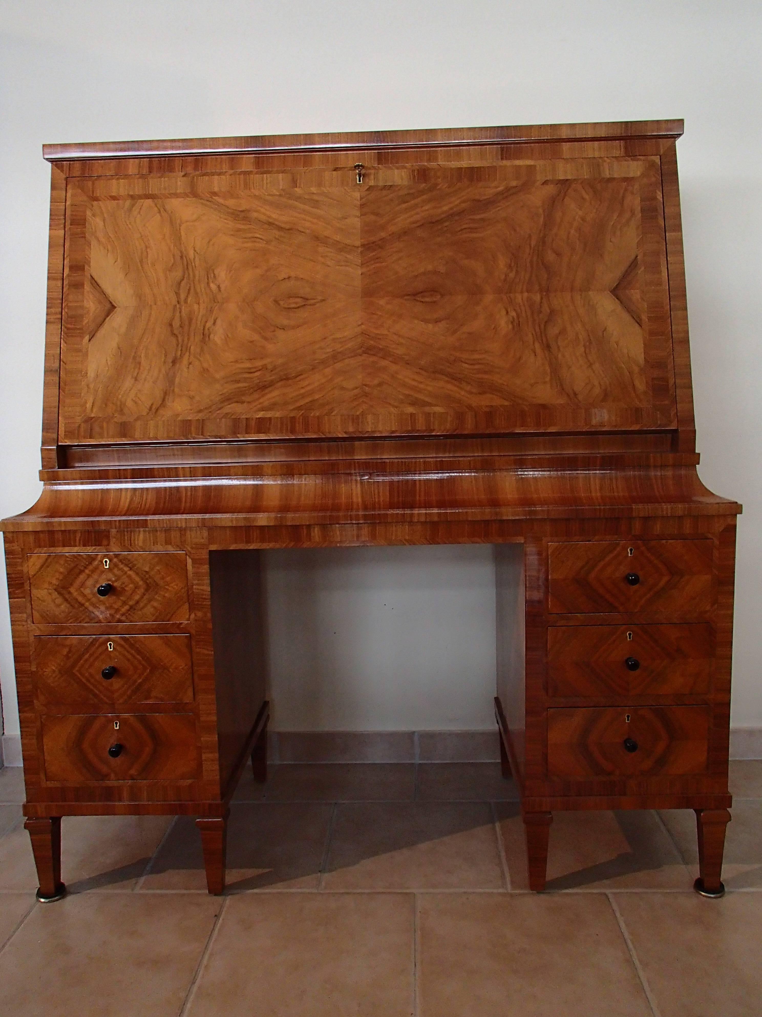 1920 walnut secretaire with 16 drawers and leather desk, comes in two parts completely restored with shellac.