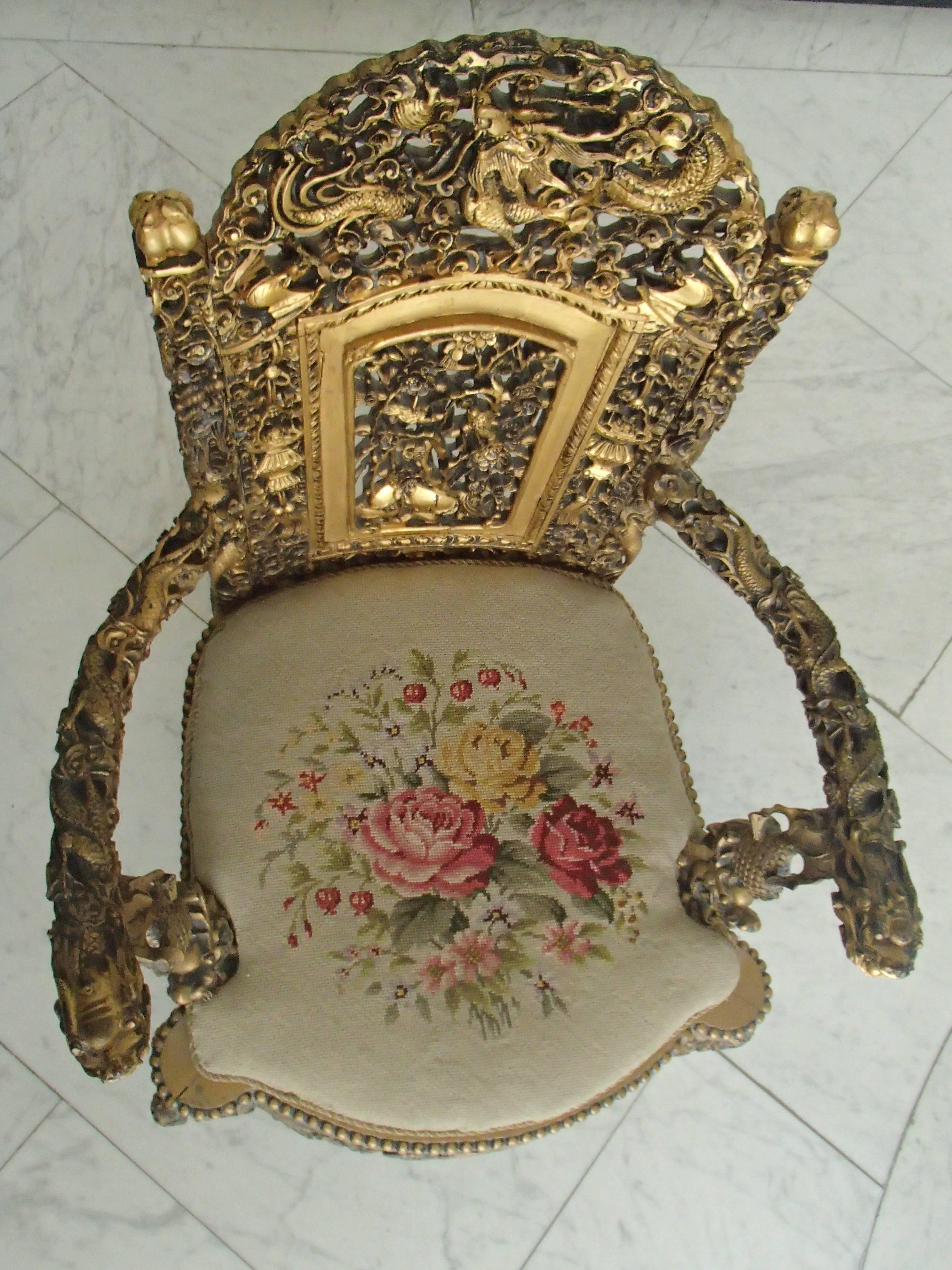 1930 Chinese armchair sculpted and gold-plated with goblin.