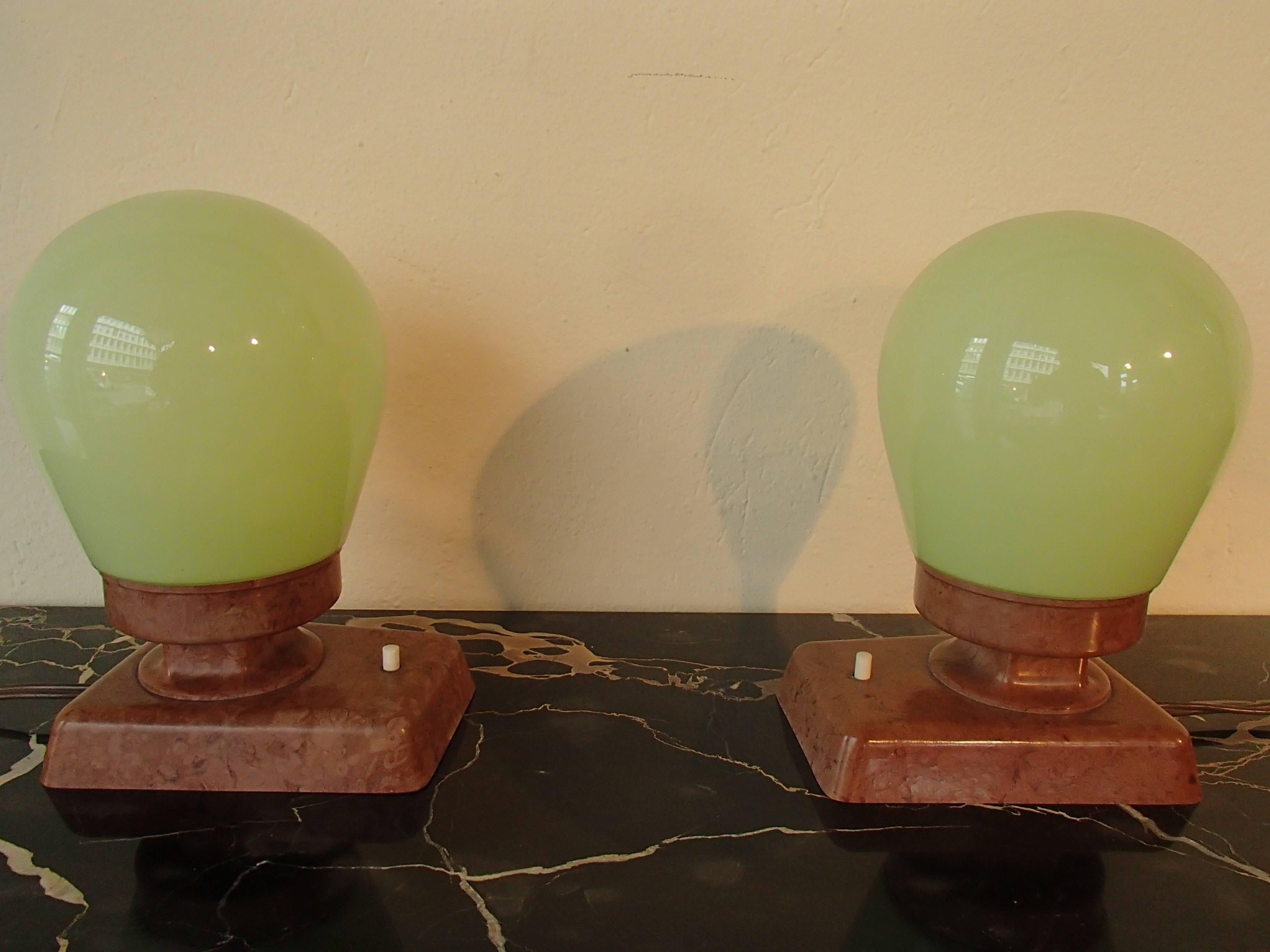 Bauhaus pair of table lamps or wall lights brown Bakelite and clear green glass.