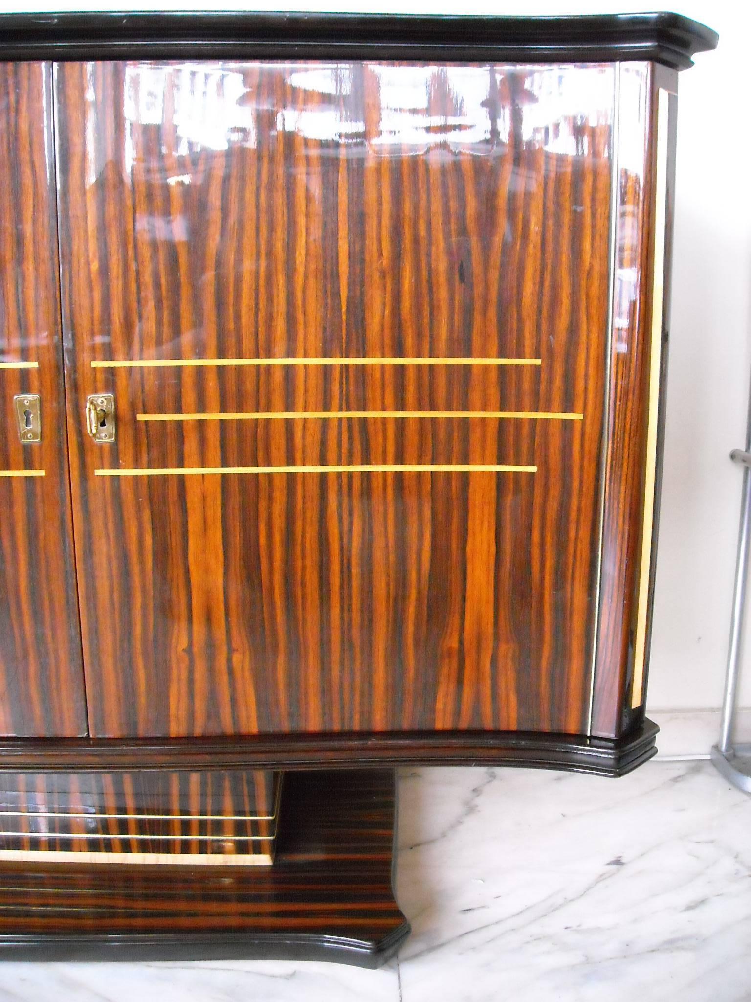 Art Deco large sideboard ebene de macassar birch inlay and mirror front.