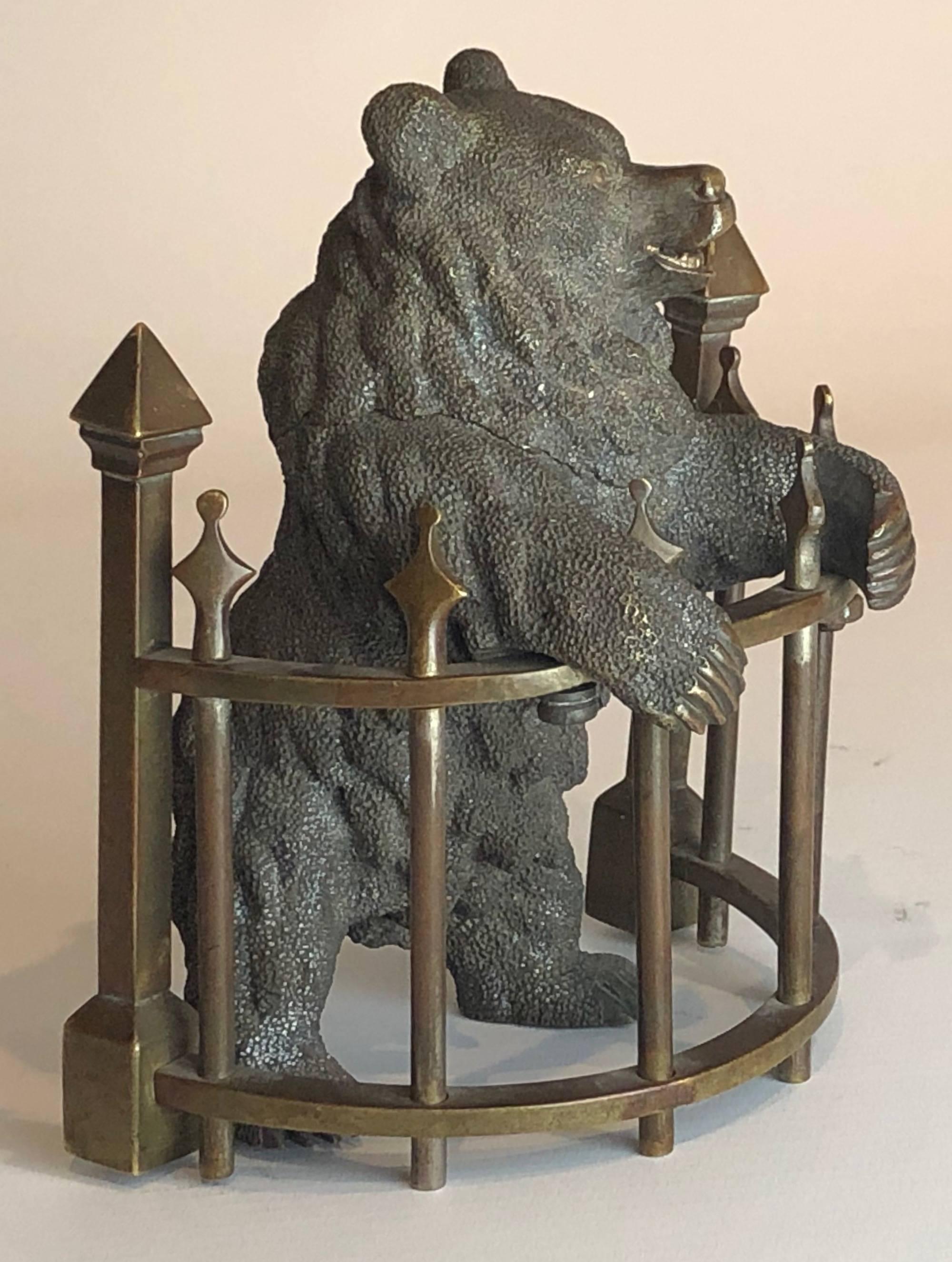 A 19th century Russian novelty bronze inkwell, finely modeled as a bear enclosed behind railings.
Russian, circa 1880.
Measures: Height 12.5 cm.