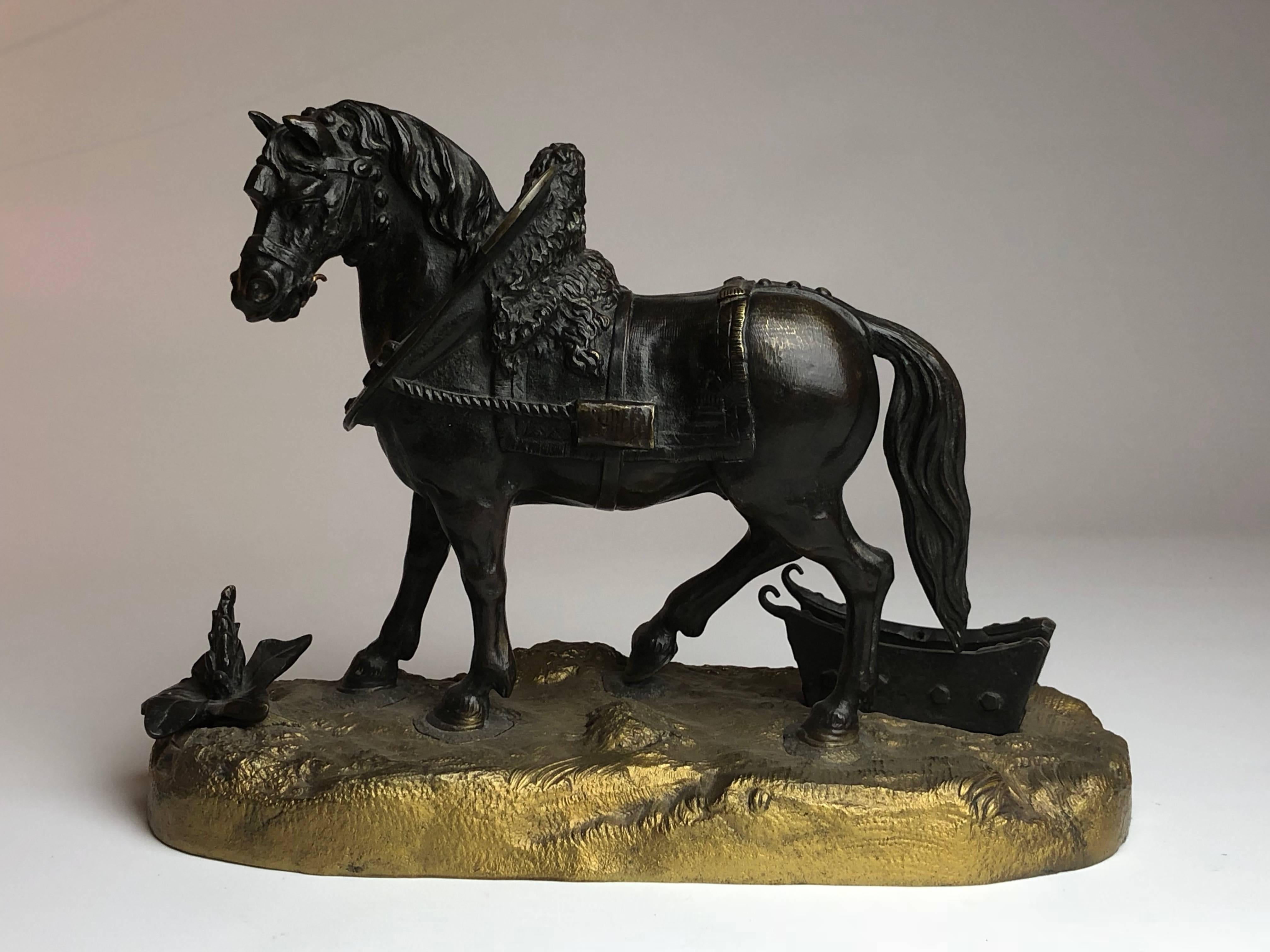 An excellent bronze study of a work horse on a gilded bronze base.

French, circa 1870

Stands 8