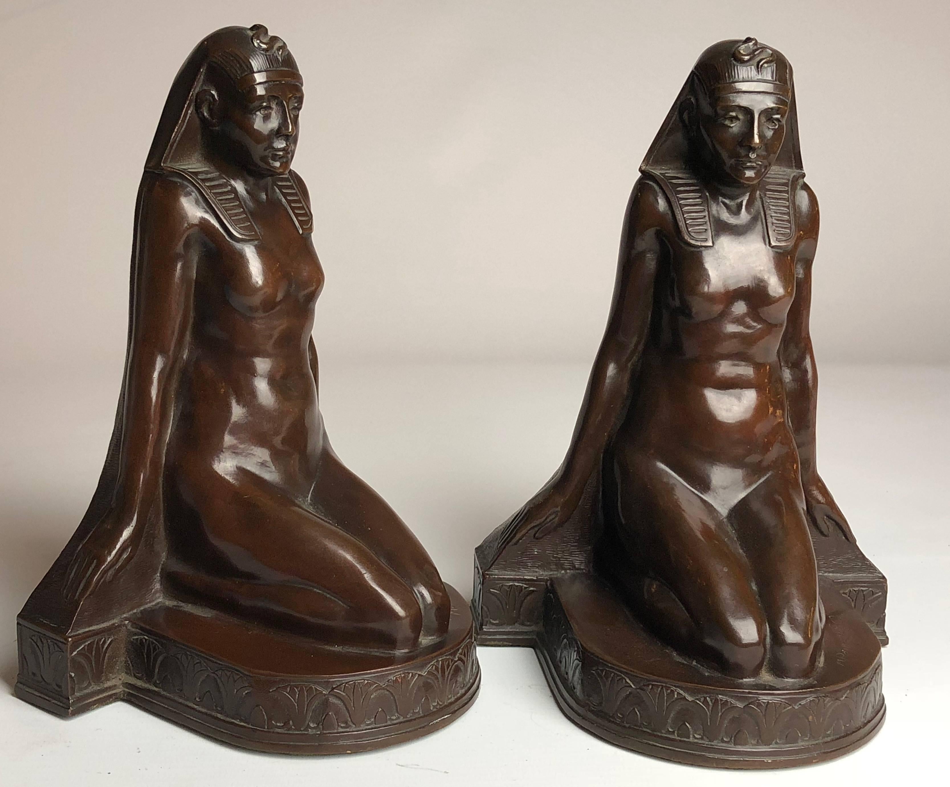 A fine pair of bookends styled in an Egyptian revival style by the New York company of Theodore B Starr, Both signed to the rear 

These bookends stand just under 8