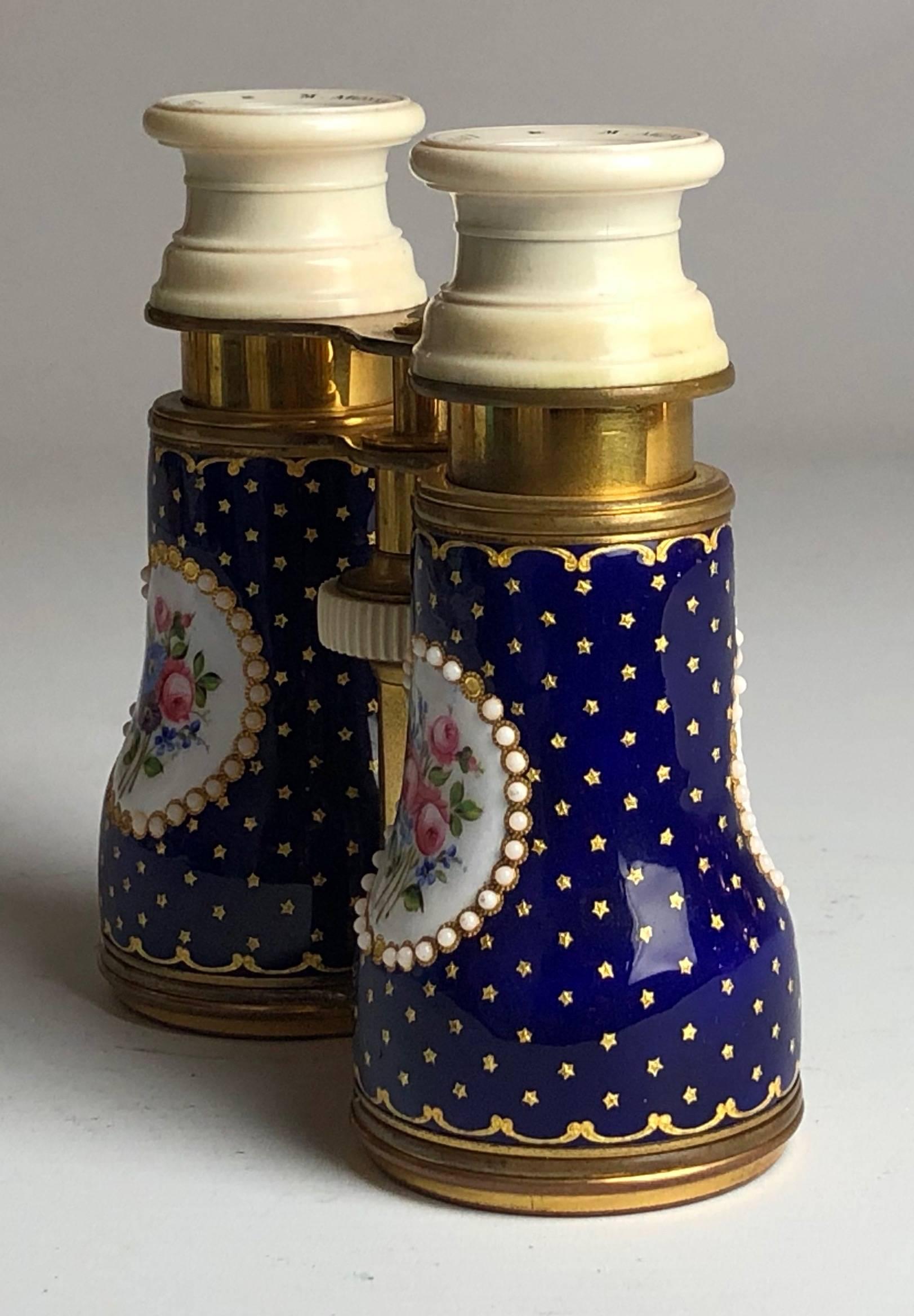 An excellent quality pair of ladies French enamel opera glasses,

France, circa 1890