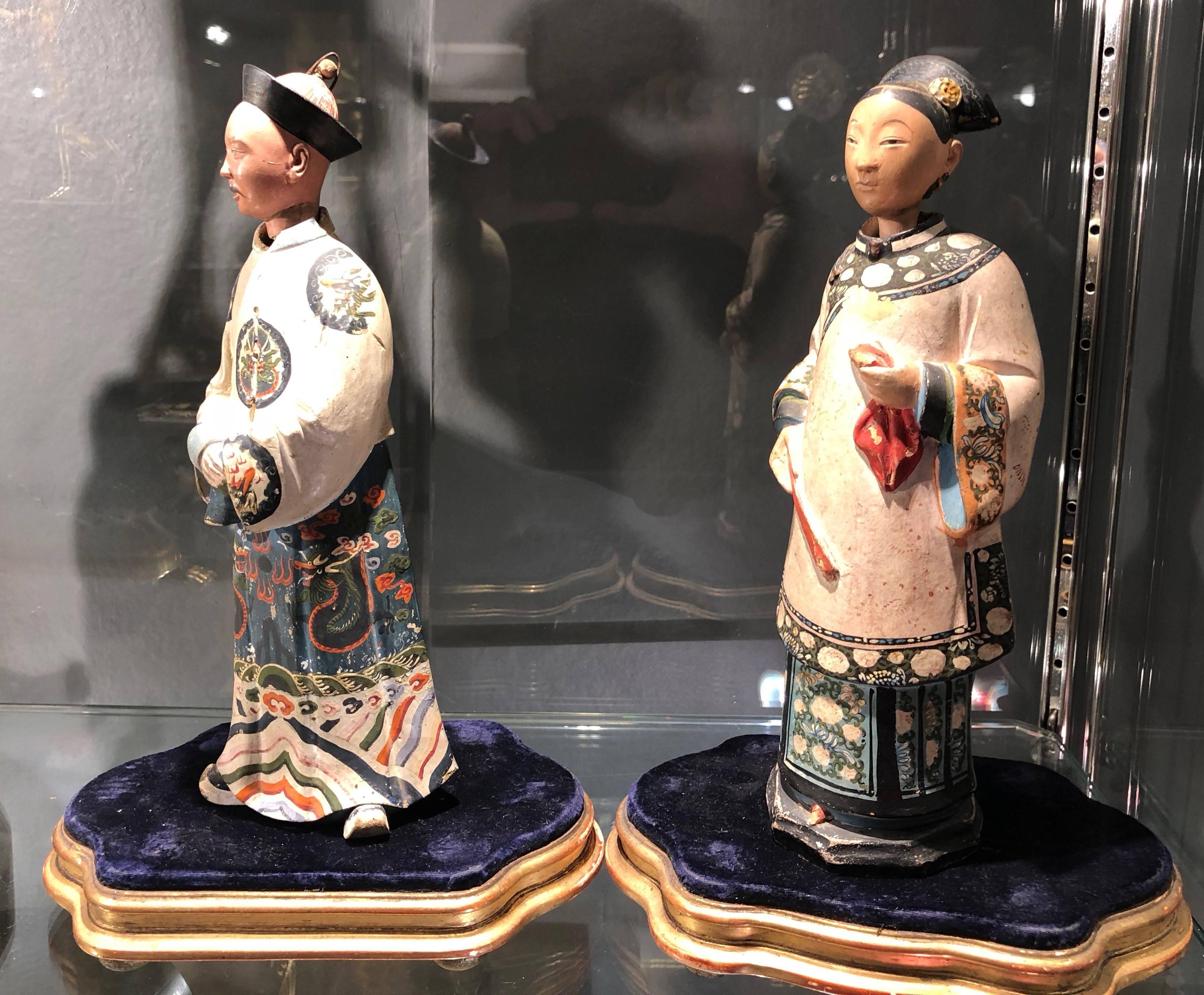 A wonderful pair of Chinese terracotta nodding figures depicting a courtier and his wife.
Made in china for the European export market.
These figures would be often placed in the entrance of English country homes and upon the door opening and