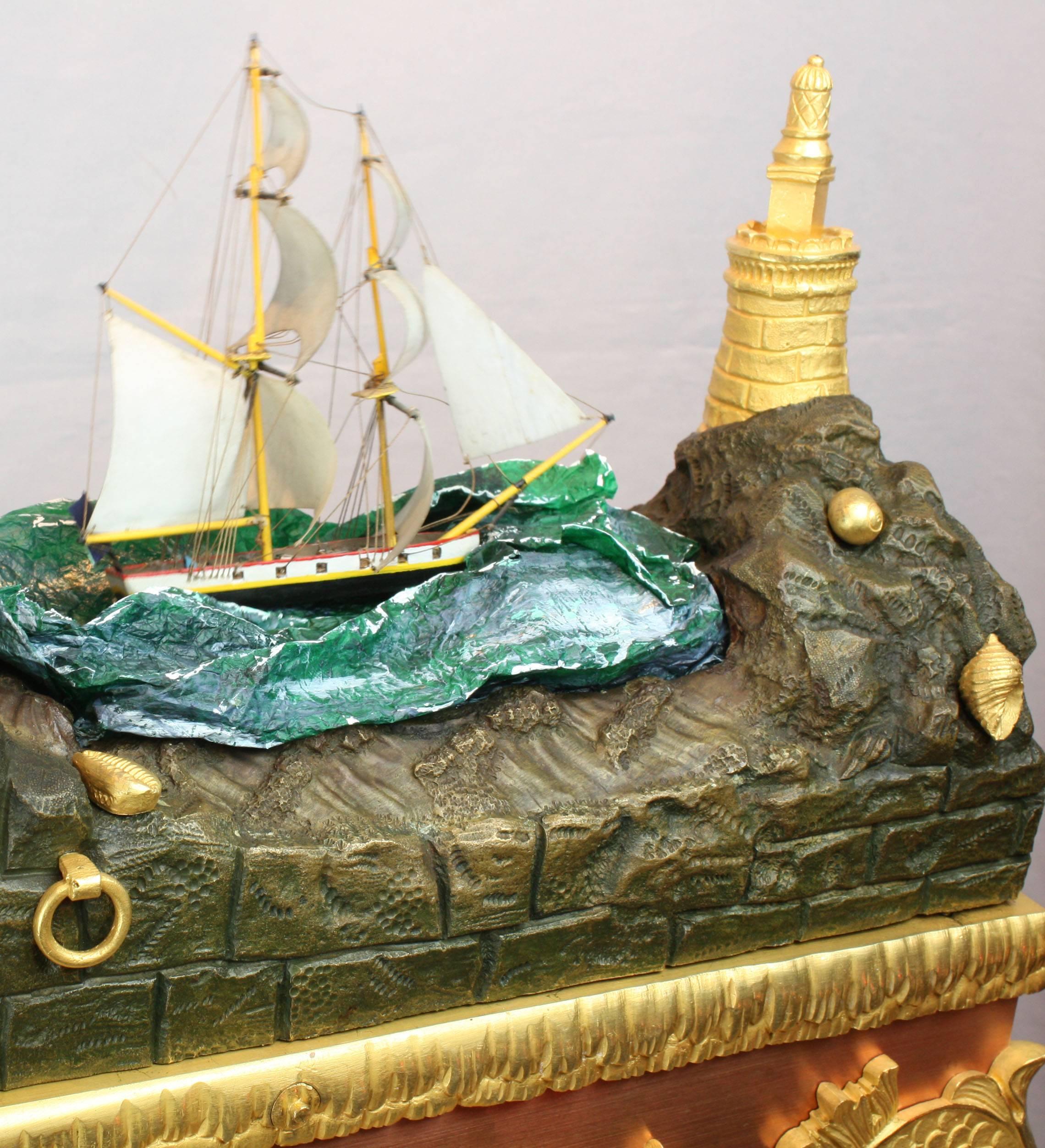 A very fine and large antique bronze, ormolu and polished copper on bronze rocking ship automaton clock,
 
French,
 
circa 1840.
 
From the first golden age of automata.
 
Our Mariner's spectacular.

A video is available upon request.
