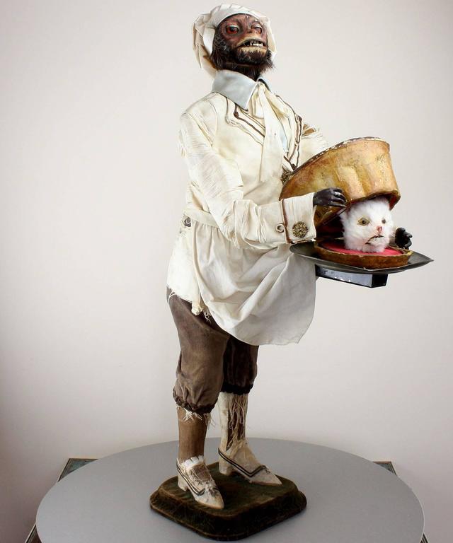 A fabulous antique monkey pastry-cook musical automaton, by Roullet & Decamps,
 
French, close-circa 1880.
 
A highly important automaton from the renowned private Decamps collection.
 
A video is available upon request.
 
When wound and the