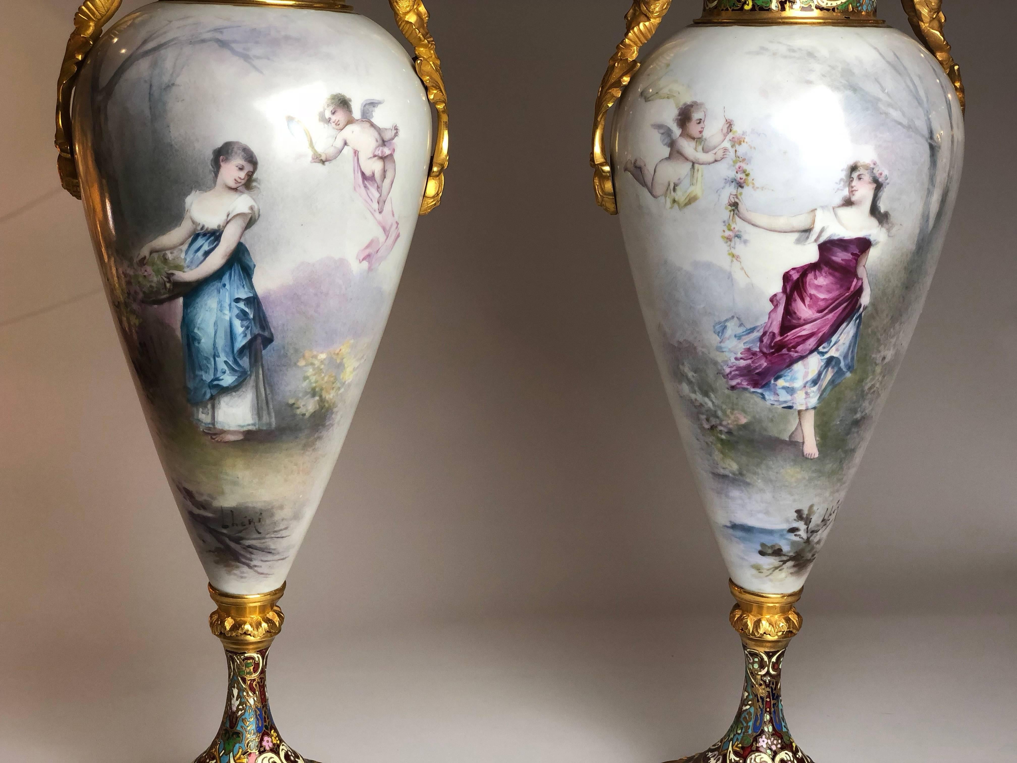 A fantastic pair of gilt bronze-mounted Sèvres vase, of the highest quality. Featuring exceptional cloisonné enamel

Both signed by the artist. 
French, circa 1870.

They stand 21