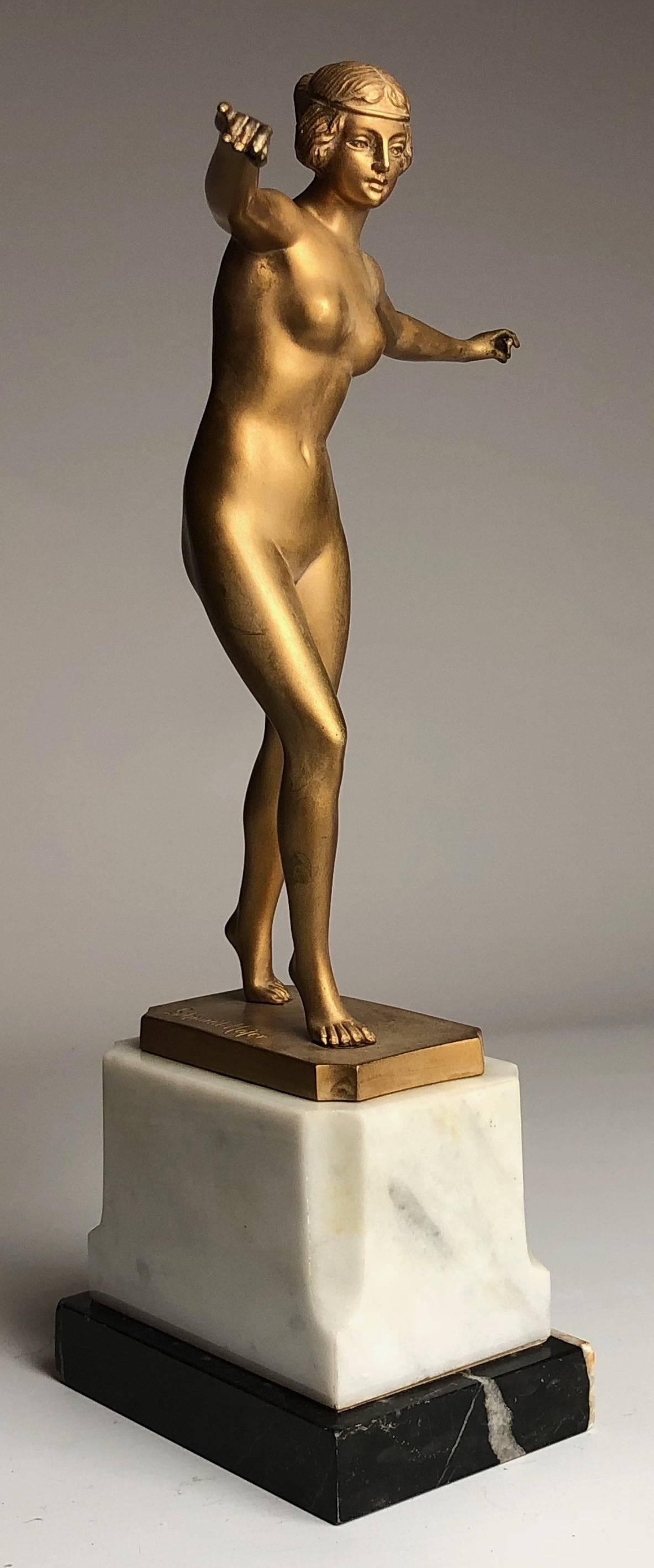 A good Art Deco figure by Otto Schmidt Hofer.
On a marble base

She stands just under 12" tall

French, circa 1920.