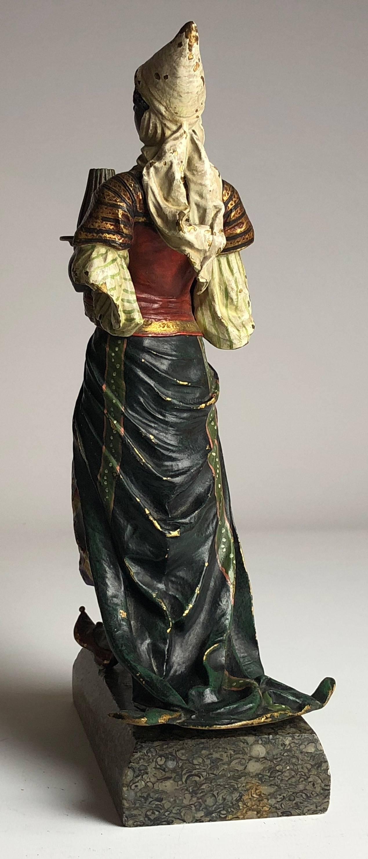 gilded loa figurine