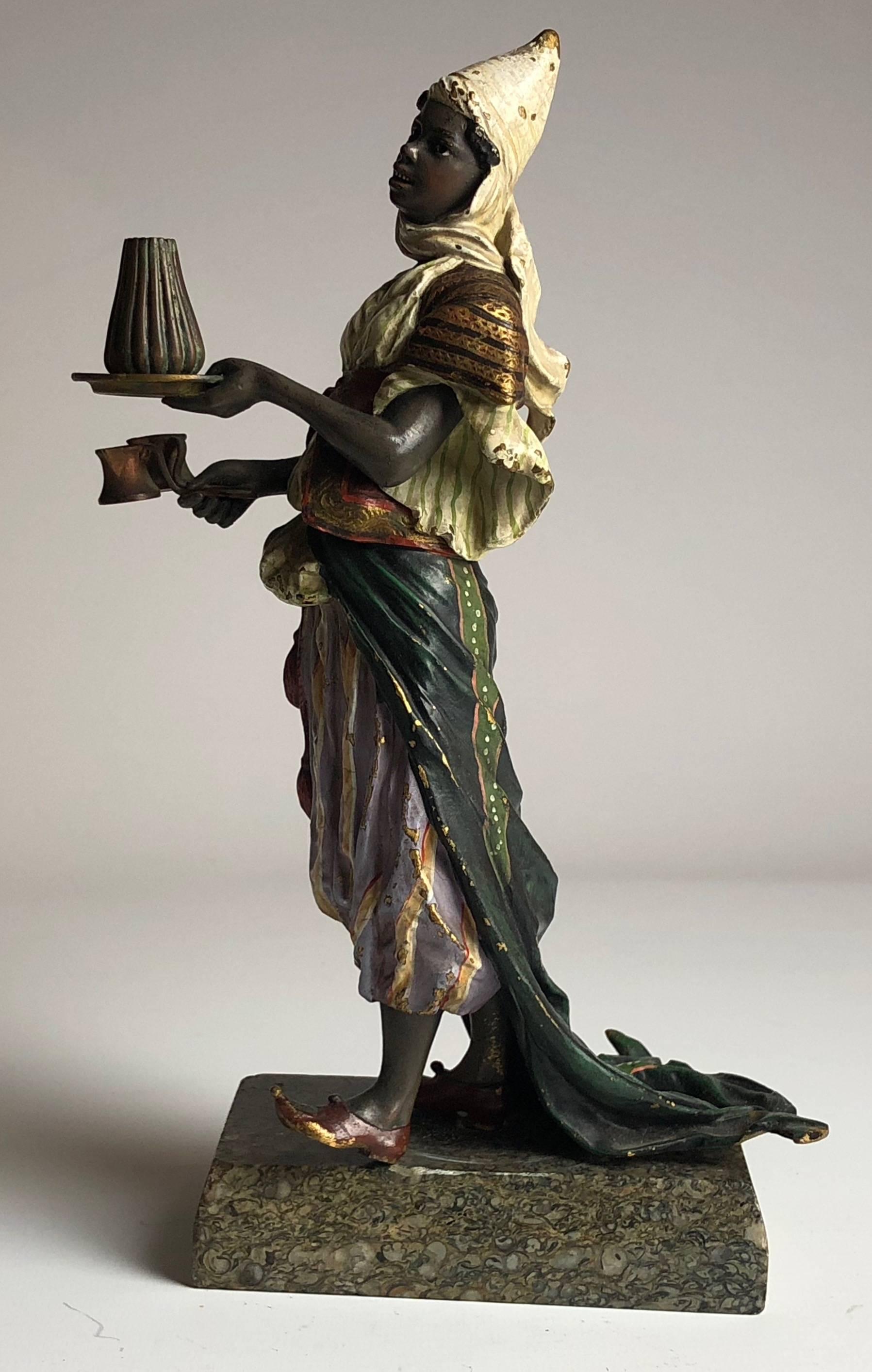 A superb early 20th century cold painted and gilded Austrian bronze study

It is very unusual to see gilding like this on a cold painted bronze figure.

Mounted on a mineral base
the boy stands 11
