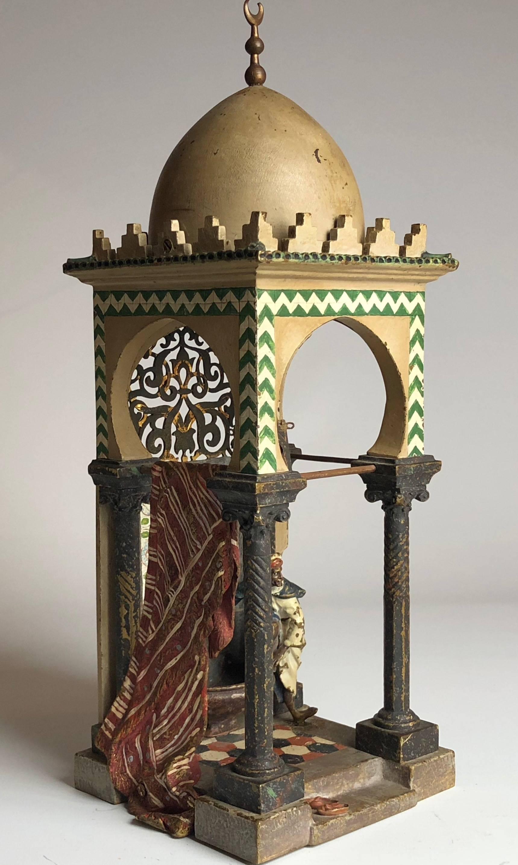 A fantastic and rare cold painted bronze lamp, nicely detailed mosque with foot washing basin and Muslim figure washing his feet. Crescent moon finial over domed top.

Marked to the base with the Bergman foundry mark.

Note: The lamp is not