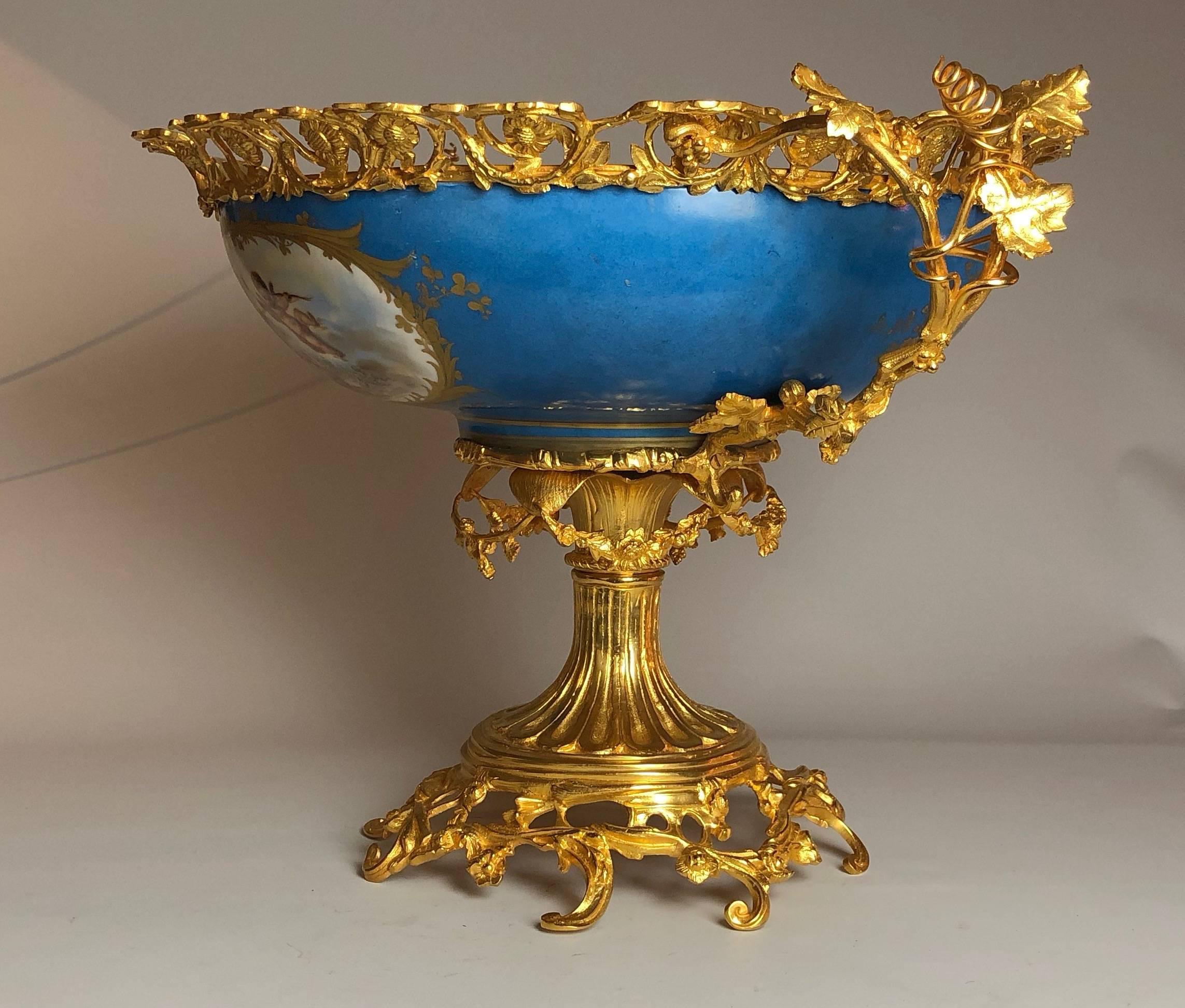 An impressive gilt bronze-mounted Sèvres centrepiece, of the highest quality.
 
French, circa 1870.

The item 21