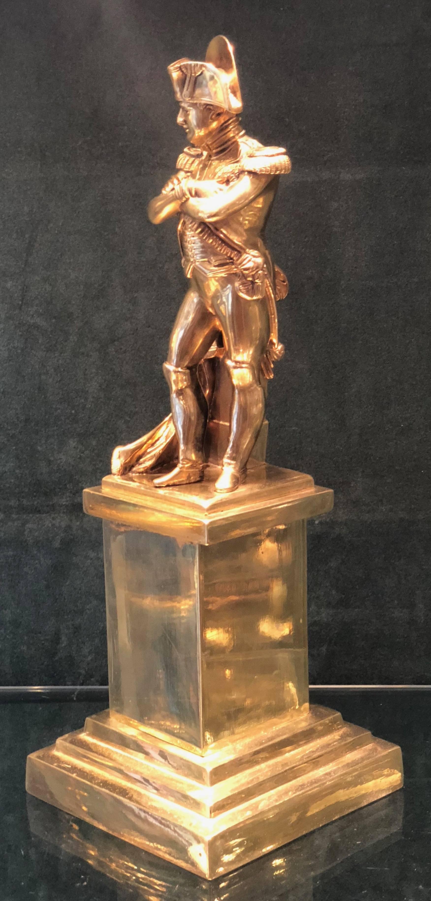 Fine quality ormolu gilded bronze of Napoleon.

He stands 14 1/2