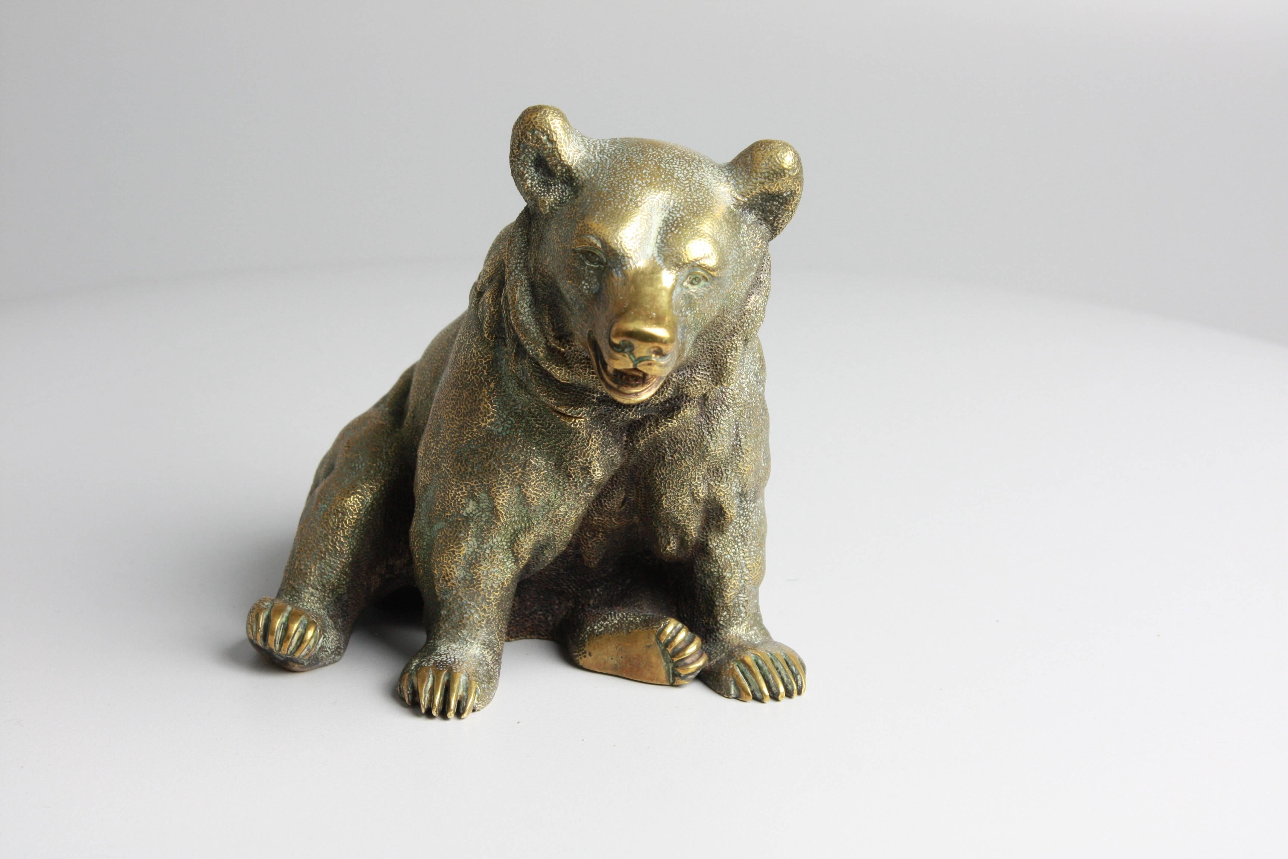 A late 19th century Russian novelty gilded bronze inkwell, finely modelled as a bear 

Russian, circa 1880.

A large example, he sits just under 5