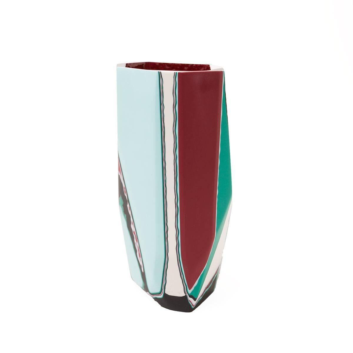 The bold and graphic Taku vase is part of our Black Magic collection, inspired by the concept of revealing that which has been hidden from sight, but remains ever-present.

Gazing toward the past, to cultures and civilizations at the edge of our
