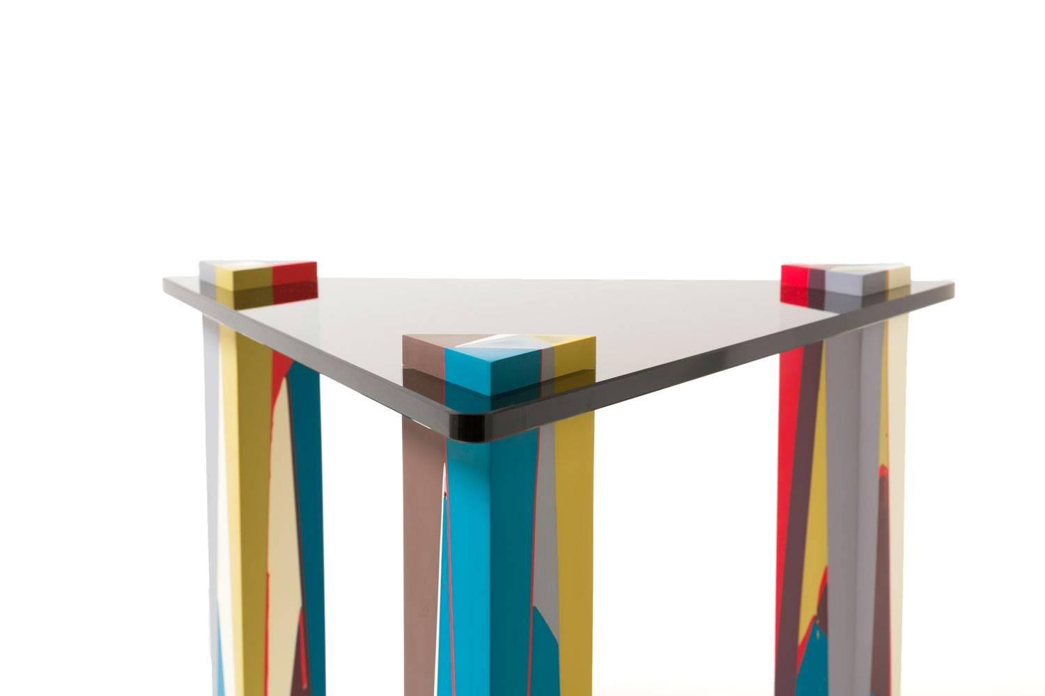 Each leg in our pair of nesting side tables is cast, shaped and sanded individually. Though the palette of the three legs is consistent within the table, each leg reveals its own pattern.

The top of the tikal side table is half inch thick