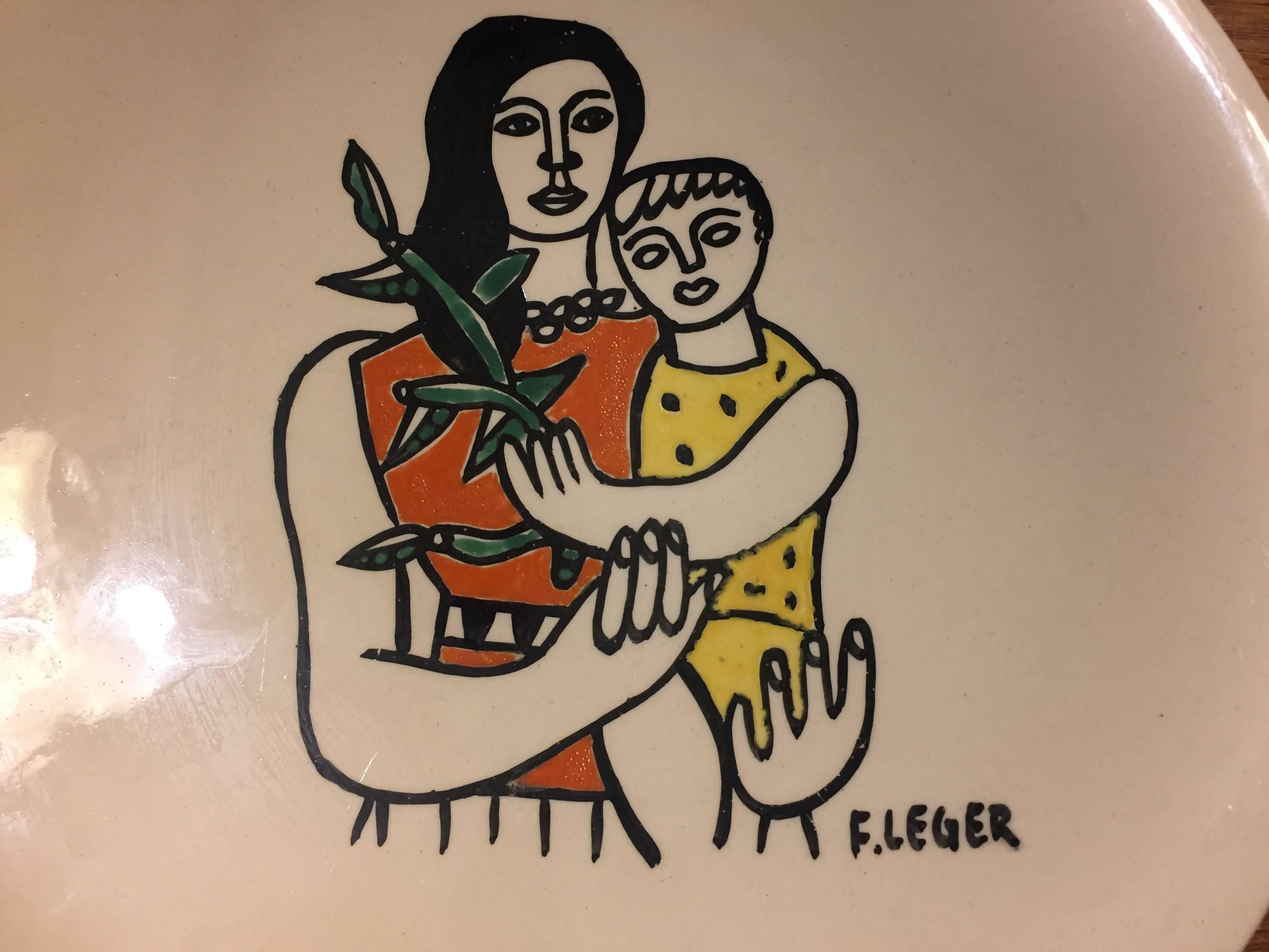 Hand-painted enamelled cream ware plate made in Salins, France, circa 1950 and likely to have been executed by his collaborator Roland Brice with whom he produced ceramics at Biot. This is an early hand-painted example not to be confused with the