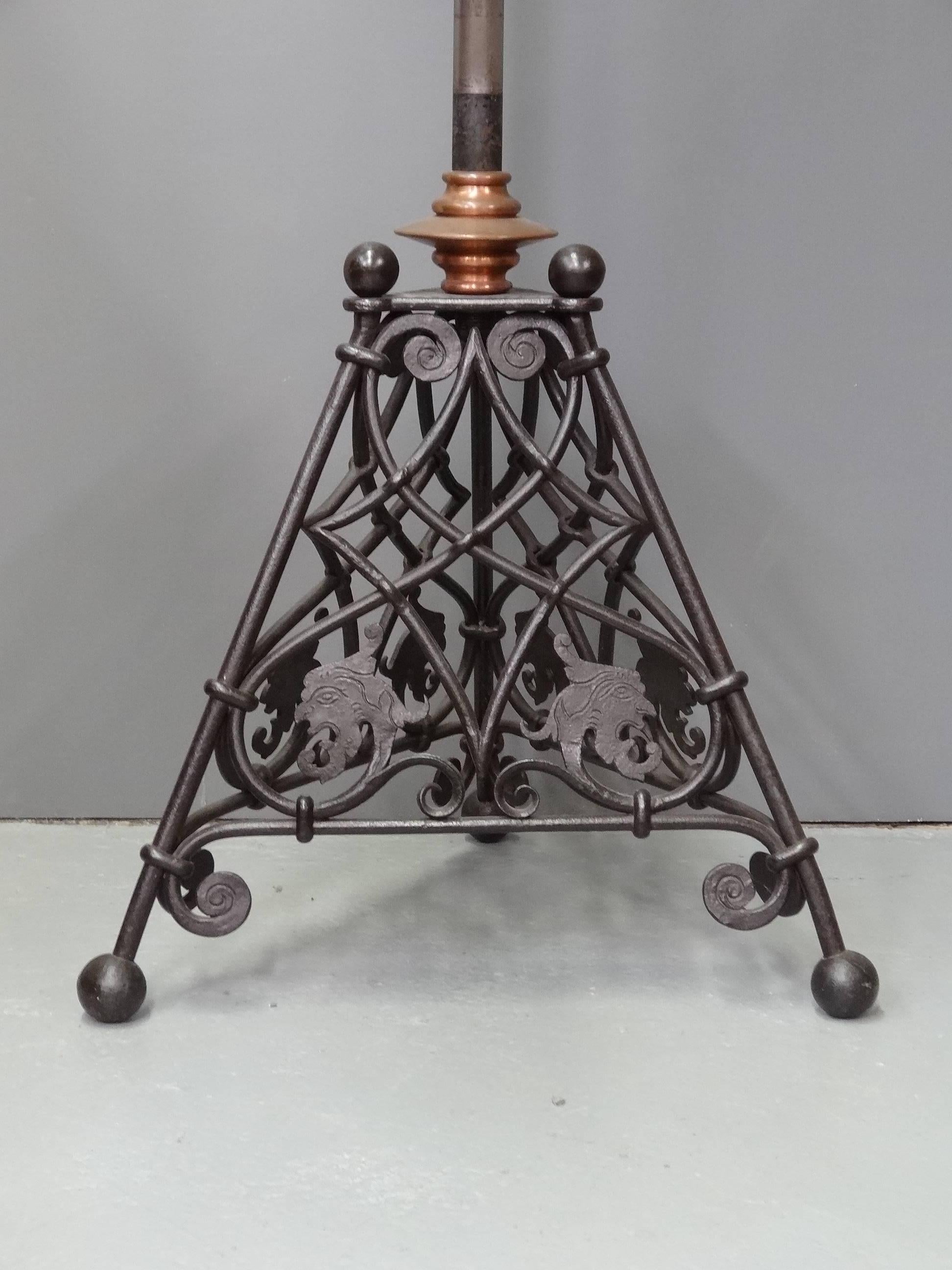 A rare wrought iron, steel and copper, Arts & Crafts extendable standard lamp, circa 1900; probably made by Thomas Elsley or W Bainbridge Reynolds, to a design strongly attributable to, the British architect-designer, CFA Voysey (1857-1941). 
