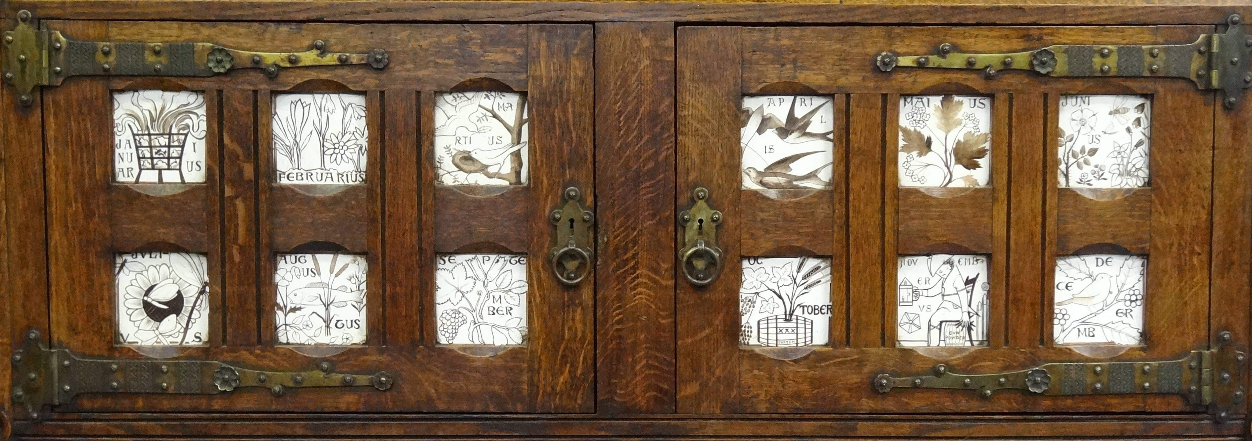 An extremely rare and superb original Gothic Revival/Aesthetic Movement oak dresser-cabinet by the great British architect-designer Charles Locke Eastlake (1836-1906).
Manufactured by Heaton, Butler and Bayne circa 1868, with twelve superb