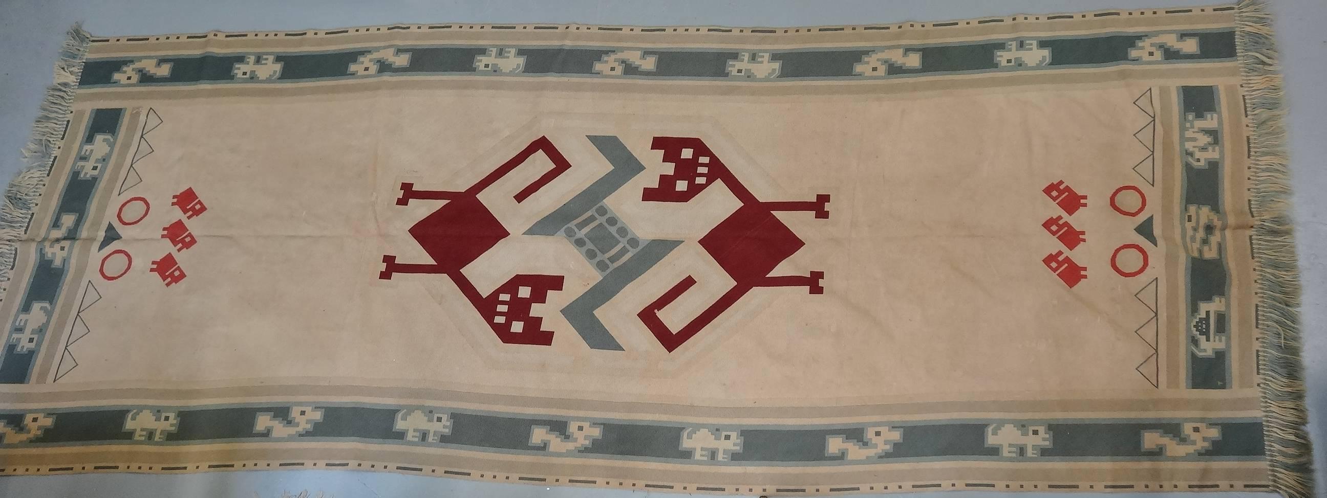 A superb and rare example of a large Folk Arts & Crafts needlework rug
by the four Tebbetts sisters of Pittsburgh, Pennsylvania, USA (signed to the edges).
circa 1930s-1950s.

Stylised Aztec style folk cat, duck and other geometric
