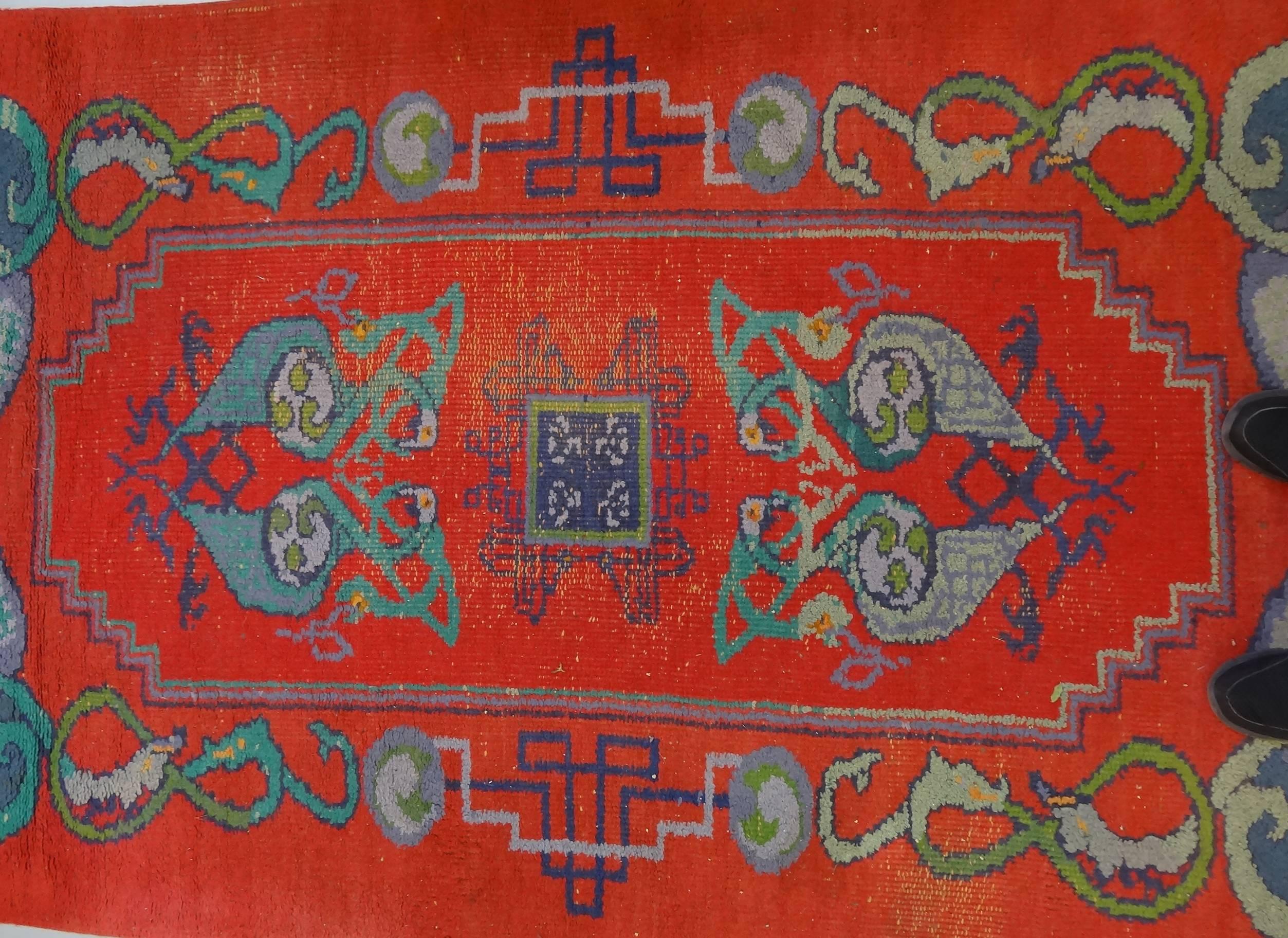 A good Celtic Revival Irish Arts & Crafts rug of compact size almost certainly by the Dun Emer Guild; c1900
Approx 225 cms by 137 cms

Faded label to back.

Stylised Celtic and other zoomorphic/pelican designs.
Reminiscent of the famous Pelican
