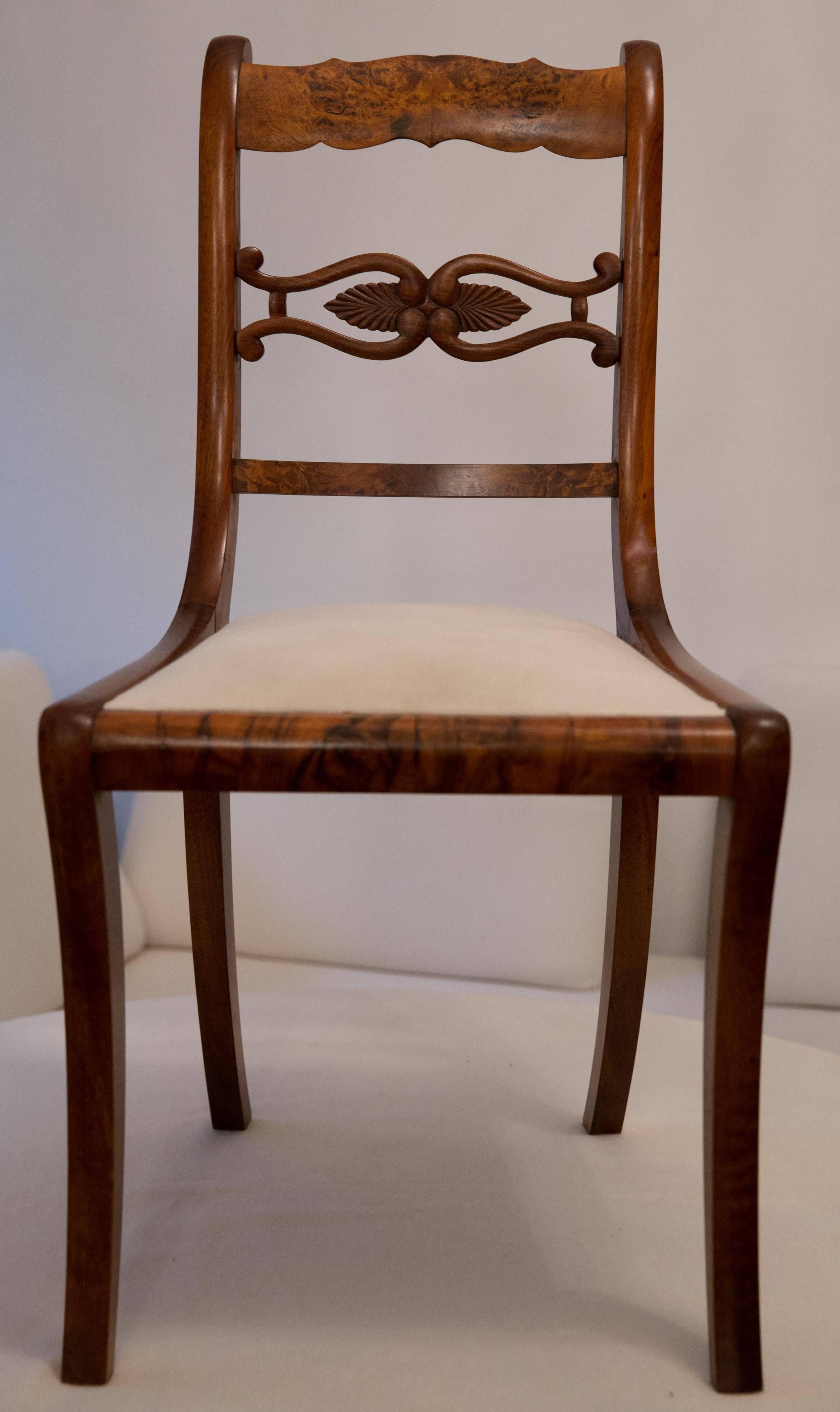 A set of six identical dining chairs, museum value, by Johann Wolfgang Knussmann, Mainz, Germany apprimately 1830. The influential Knussmann (*1766-†1840) was commissioned by royals and nobles, amongst them Napoléon Bonaparte. 
The six exquisite