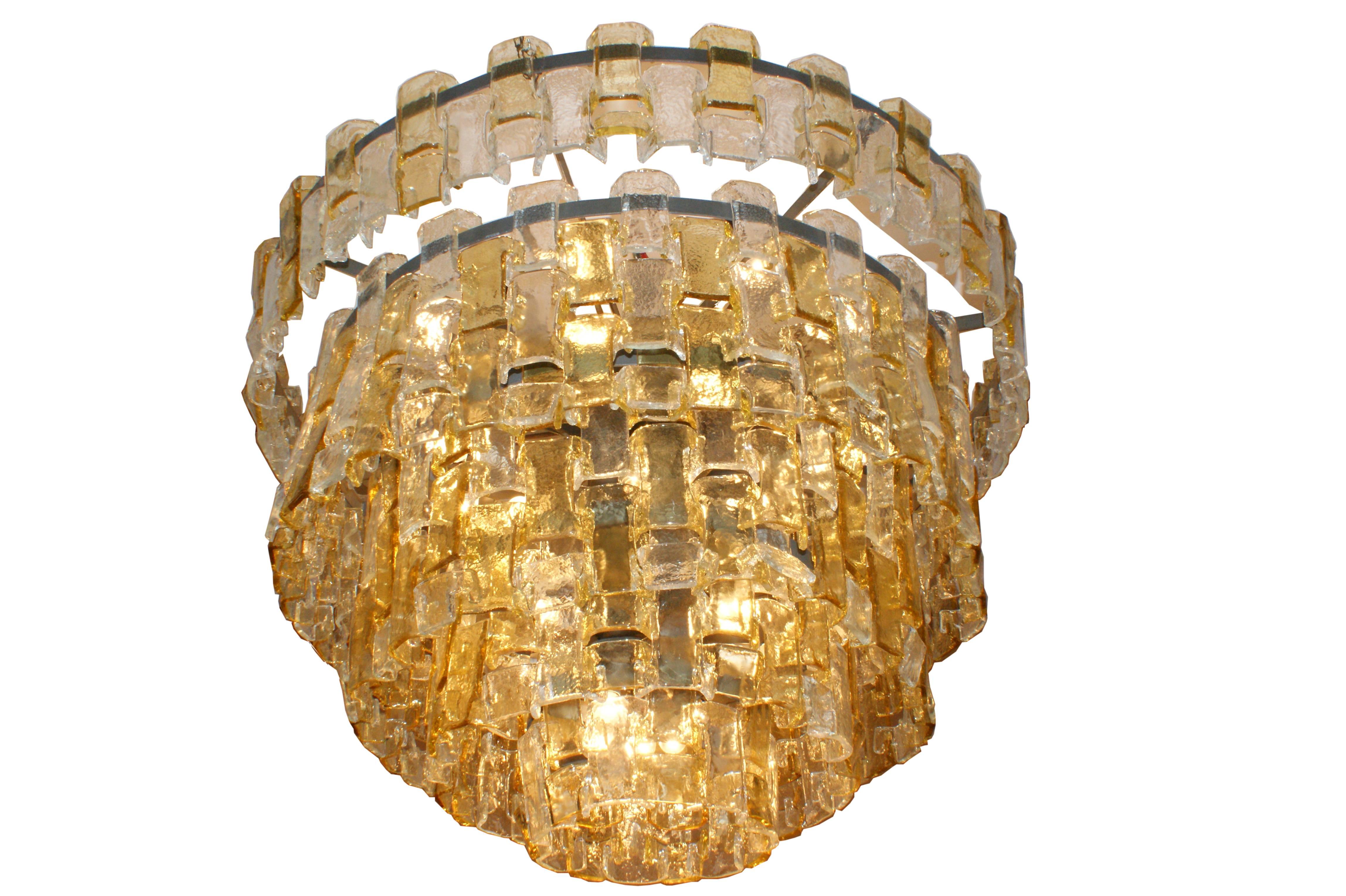 Big chandelier by Mazzega Murano. Steel structure and five rows of yellow and transparent glass leaves, Italy, circa 1960. Dimensions: cm H 110 x diameter cm 140.