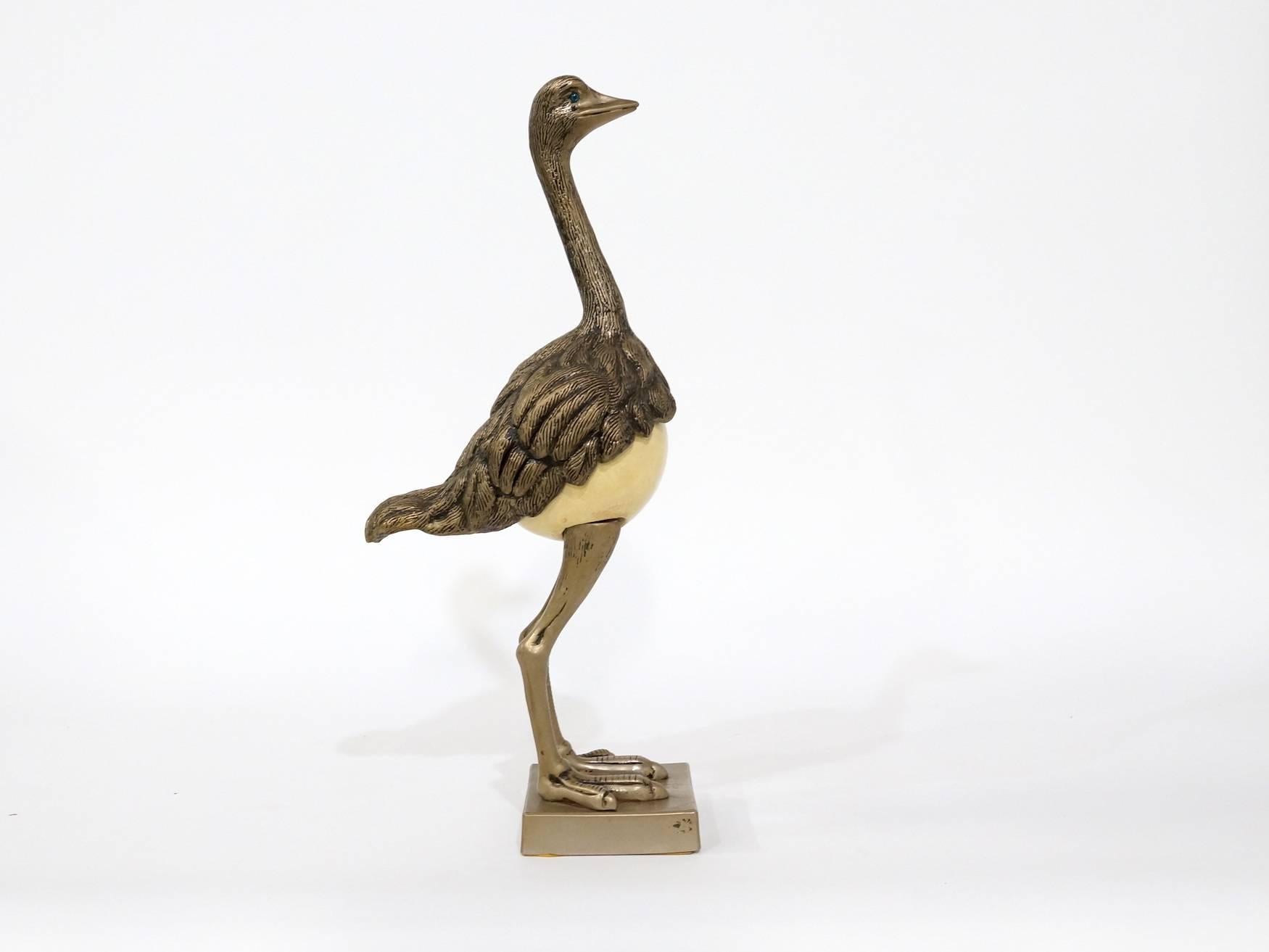 Brass decorative struzzi in the style of Gabriella Crespi
French, 1970s brass ostrich sculpture with ostrich egg.
This is a really lovely, charming piece of sculpture. There is something very beguiling about it. It feels weighty and high quality.