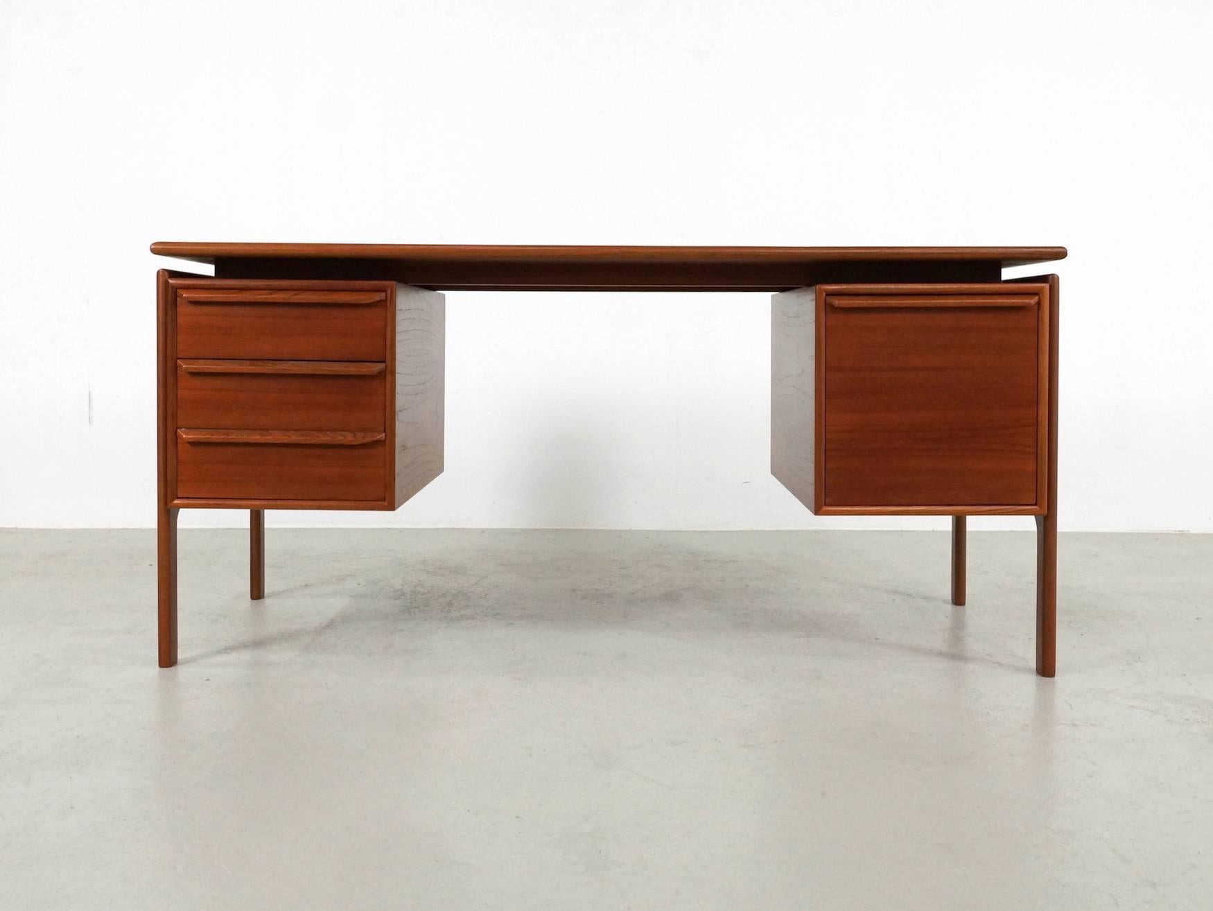 Beautiful Danish teak desk designed by GV Gasvig for GV Møbler. This desk is nice in simplicity and functionality. The desk has been professionally re-lacquered and is in perfect condition. The desk demontable for shipping. so the size for shipping