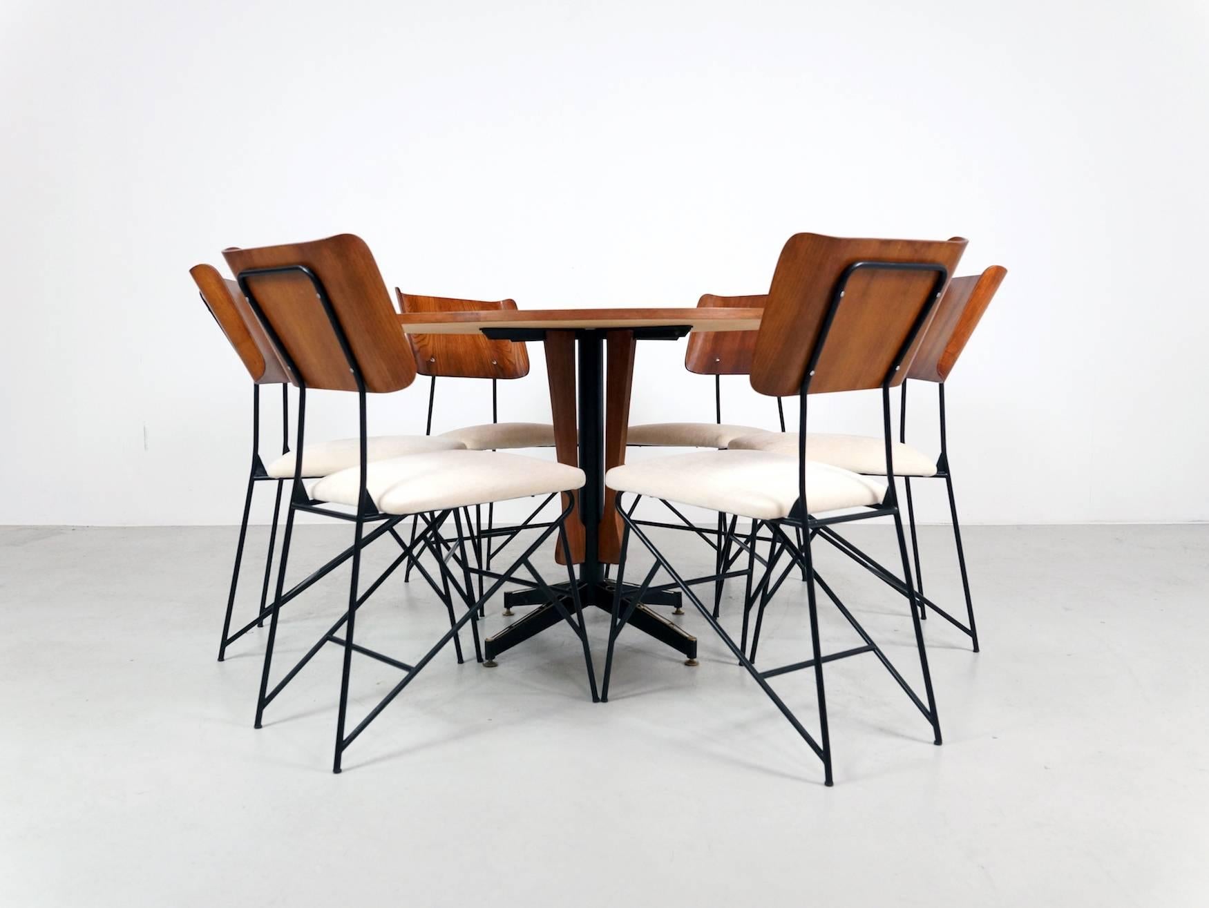 Highly desirable set of six Carlo Ratti Chairs from the 1950s in perfect condition. The chairs wood and frame looks grate with very nice new fabric seats. This set of six chairs from Italy are not so common to find.
 