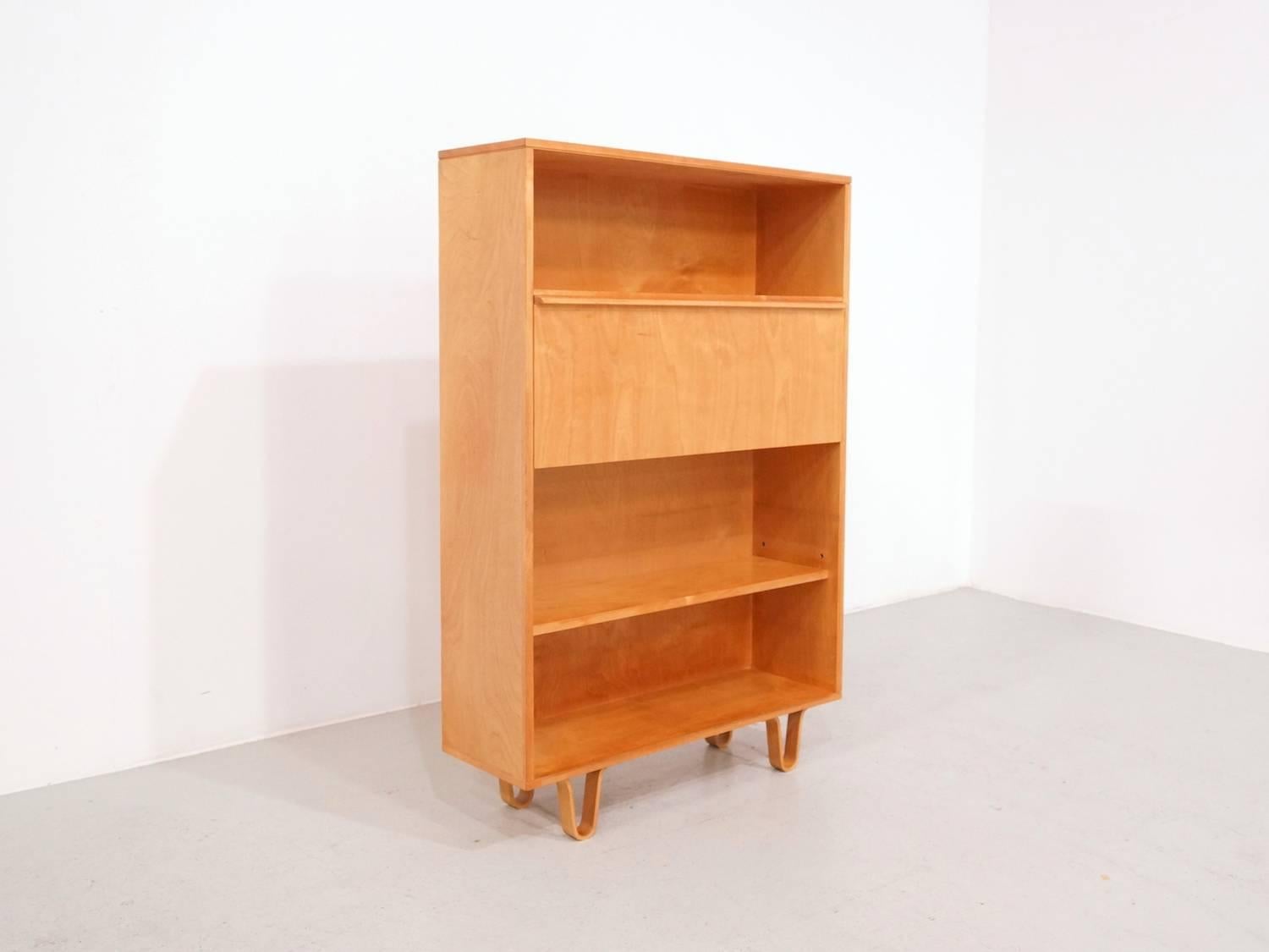 Beautiful bookcase -desk from the Birch series, designed in the 1950s by Cees Braakman. Manufactured in the Netherlands by Pastoe in the 1950s. The Birch series is one of most beautiful and sought after Designs from Cees Braakman. The simple design