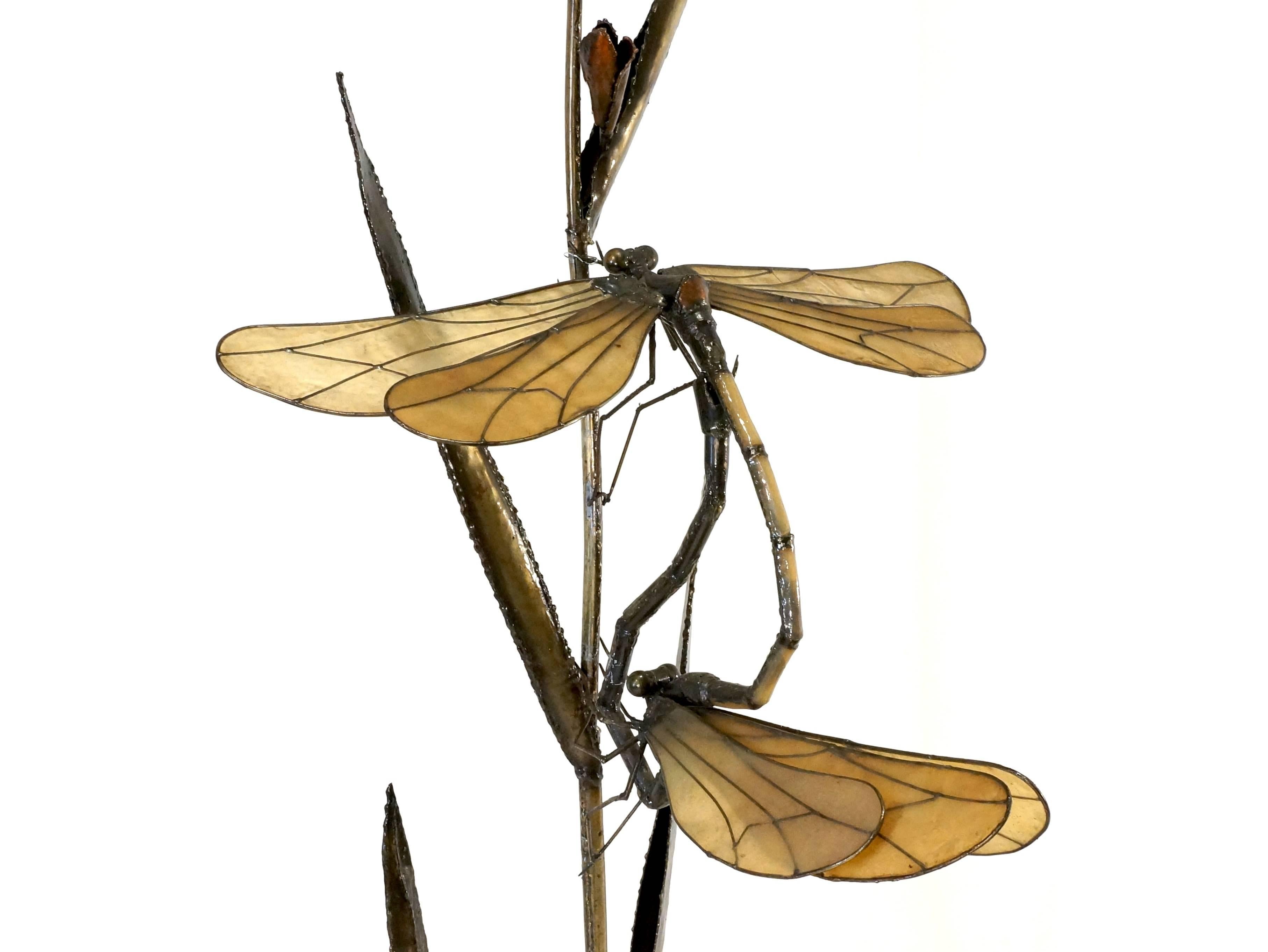 This is one of the Hollywood Regency items we kept for long time in our private collection. The dragonfly sculpture, this metal and brass colored sculpture is made in the 1970s and not signed, for me it looks like the style of Curtis Jere but I know