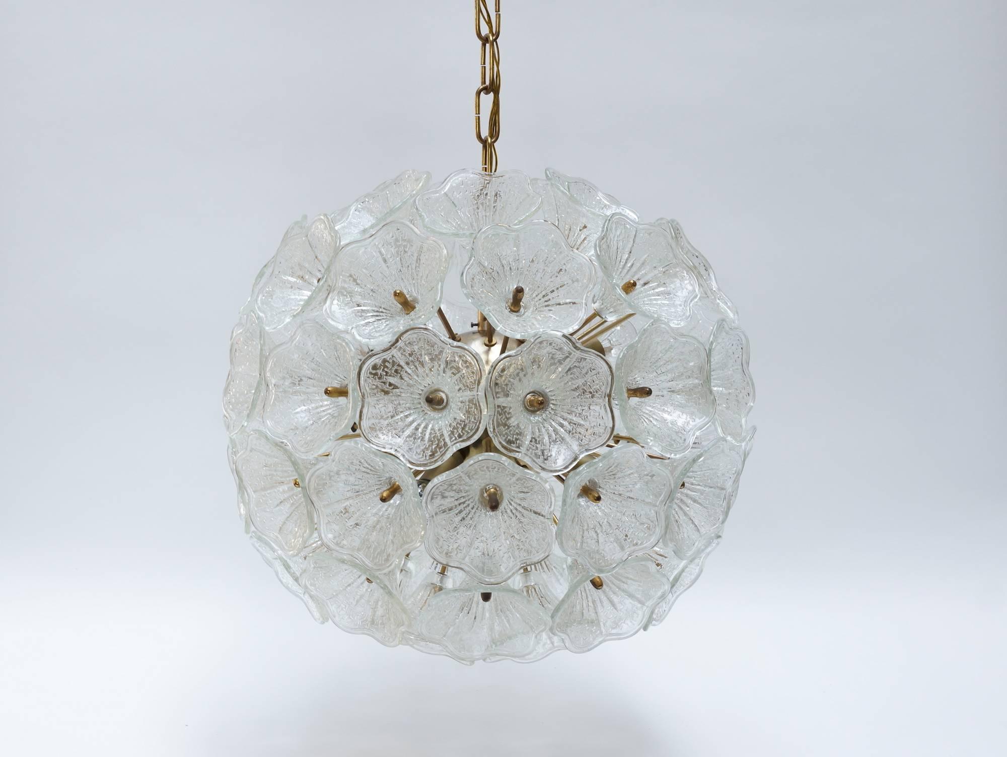 Beautiful Glass Murano Sputnik with 56 glass flowers on a brass Sputnik base in very good condition. Designed in 1960s Sputnik lamp by Glass Studio Murano Italy. The lamp is great when its out but gorgeous when it lights. The Sputnik has in total