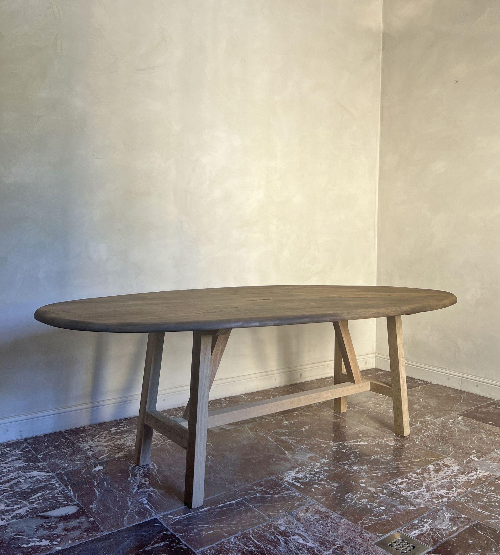 Our LUSI dining table is based on 17th and 18th century mountain trestle tables. The trestle base is manually assembled and proportioned following the golden cut. The 2 plank top is made from local walnut harvested out of 1 tree. The planks are