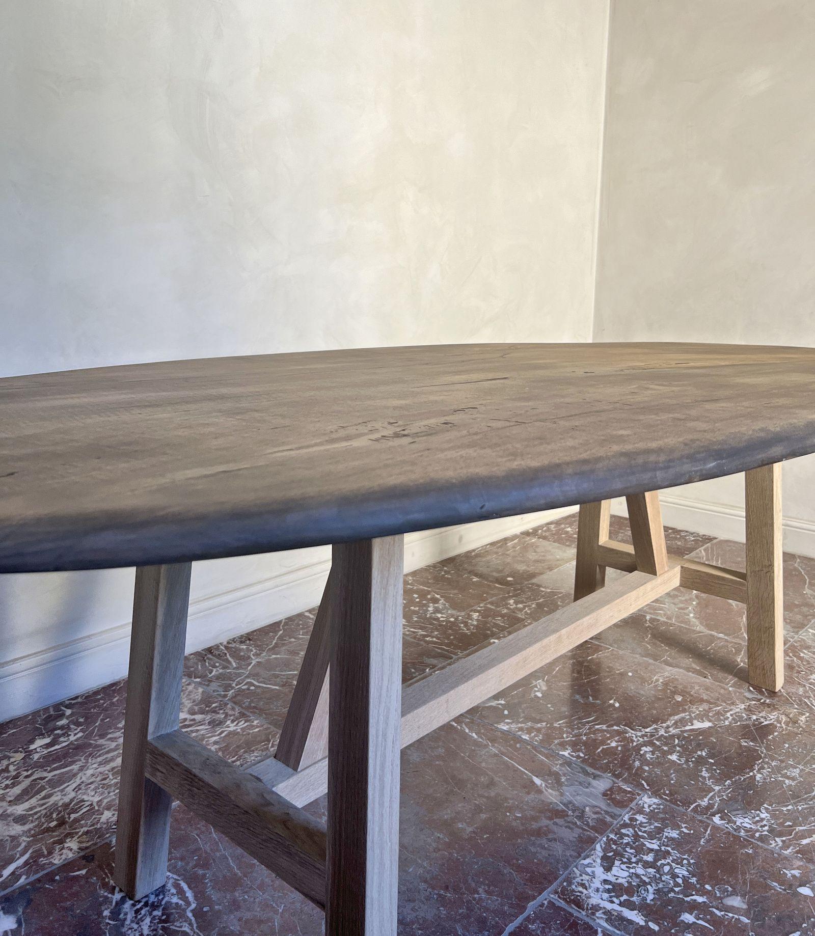 Custom walnut 2 plank top oval dining table Model LUSI For Sale 1
