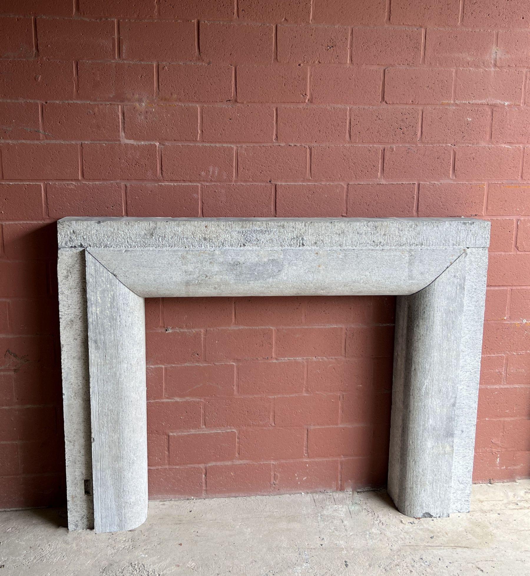 Hand-Crafted 19th century primitive bolection stone fireplace chimneypiece For Sale