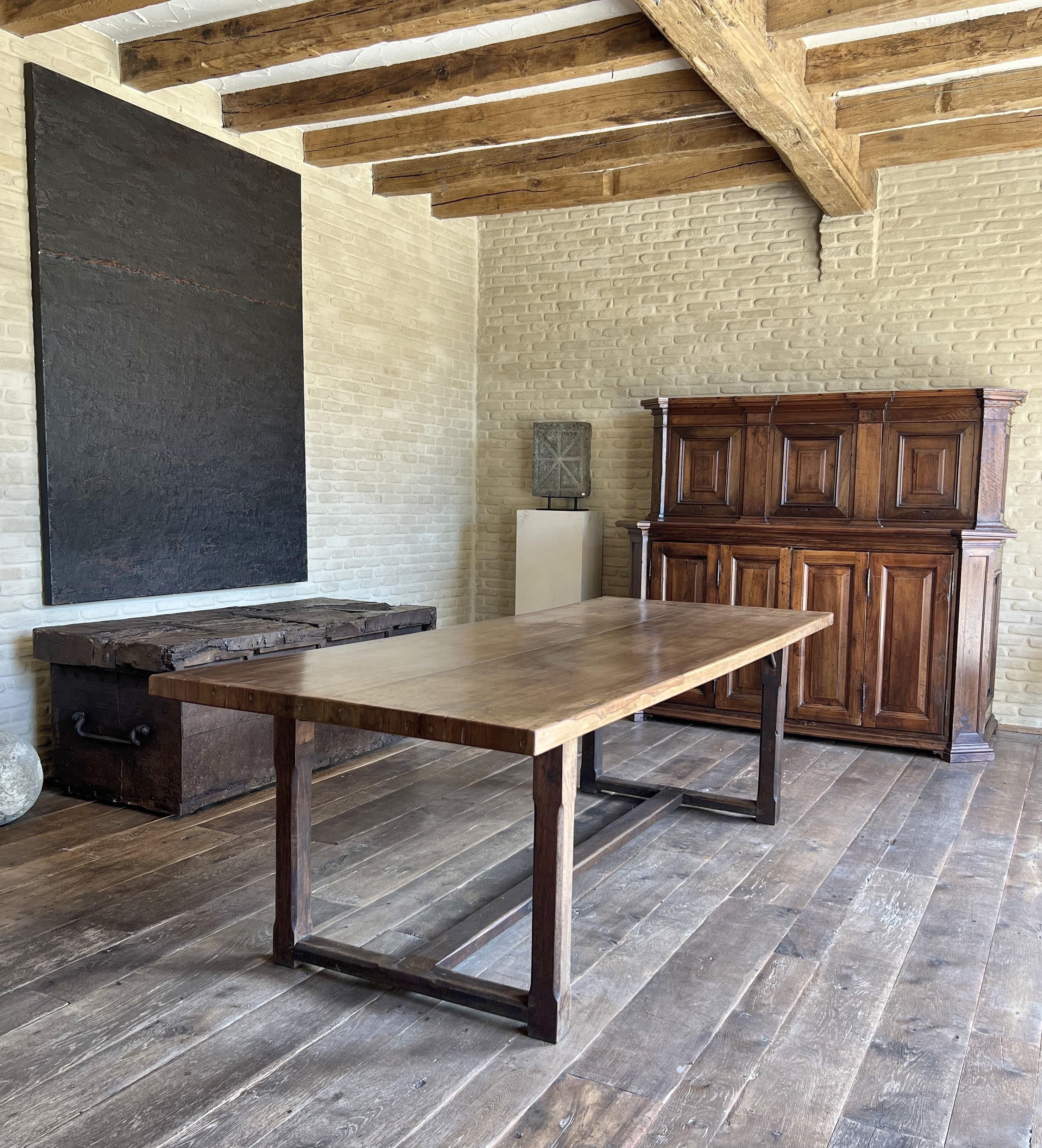 A great late 18th century Italian walnut refectory table with a exceptional two plank top. Beautiful proportions, great walnut with subtle patina. Verry sturdy and excellent dimensions.