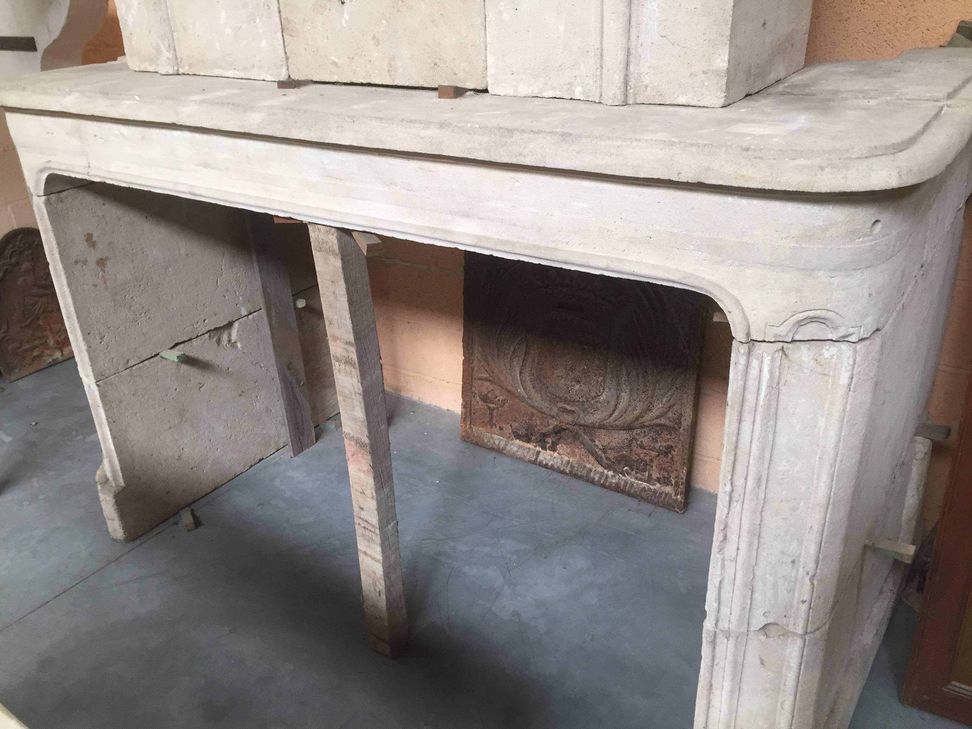 Hand-Carved Early 18th Century French Chimneypiece, Mantelpiece with Trumeau For Sale