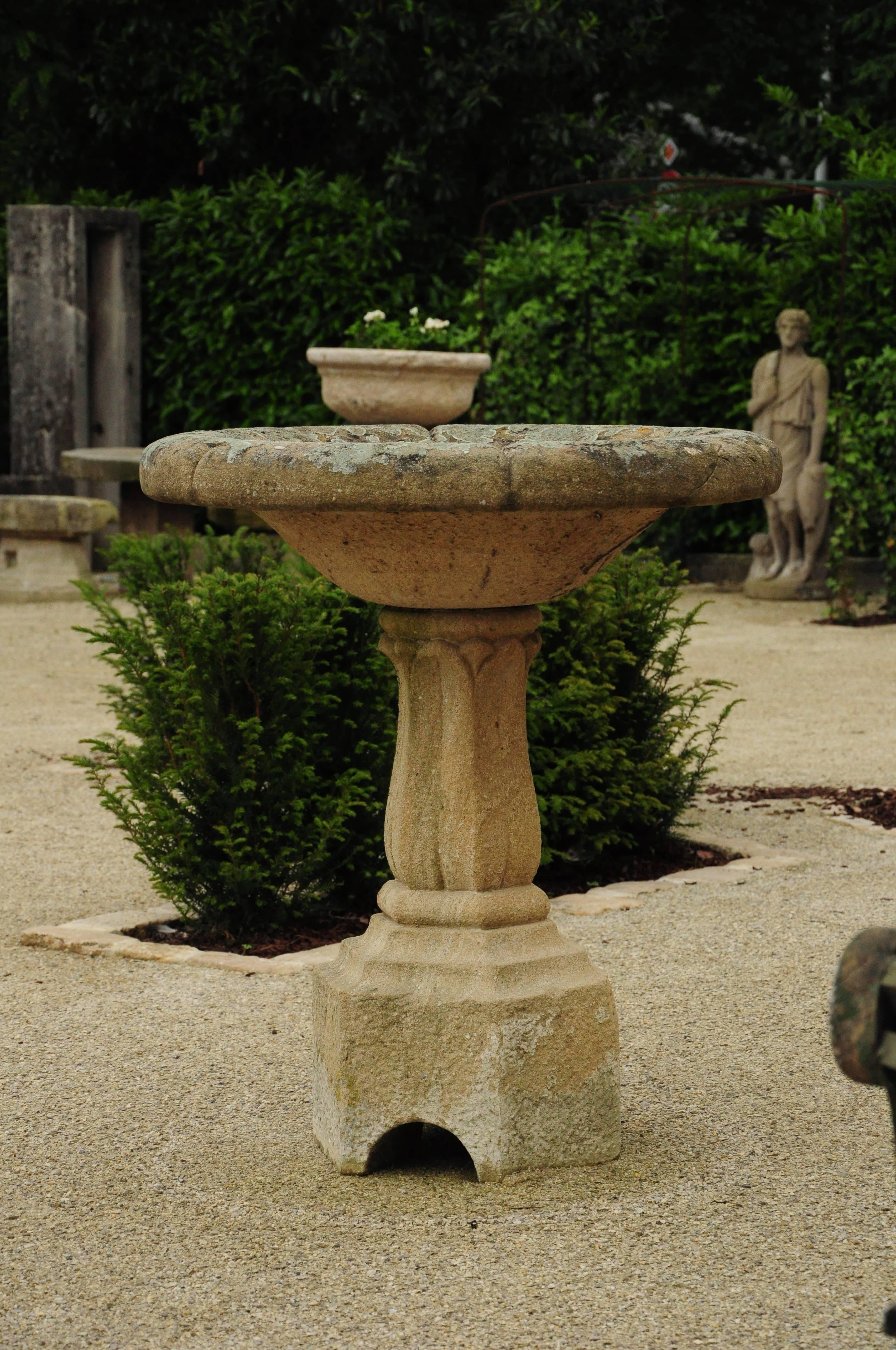 This elegant sandstone fountain was found in France. Its fluent lines and vegetal motives are reminiscent of the early 19th century and in particular the Napoleonic period. His Egyptian campaign was a great inspiration for artists and architects.