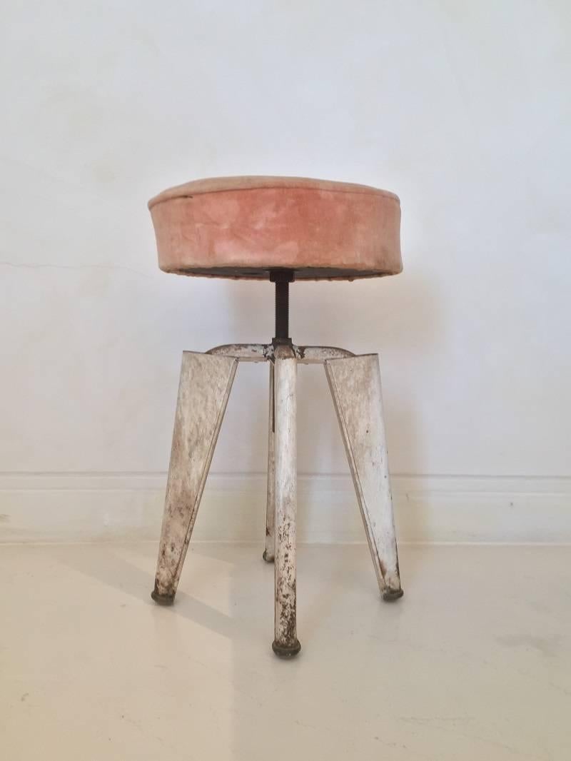 This is a good example of the so called Janville Tabouret made by the workshop of Jean Prouve in collaboration with Famous French High Society designer Jules Lelue. It has the typical modernist V shaped legs which became a iconic signature for