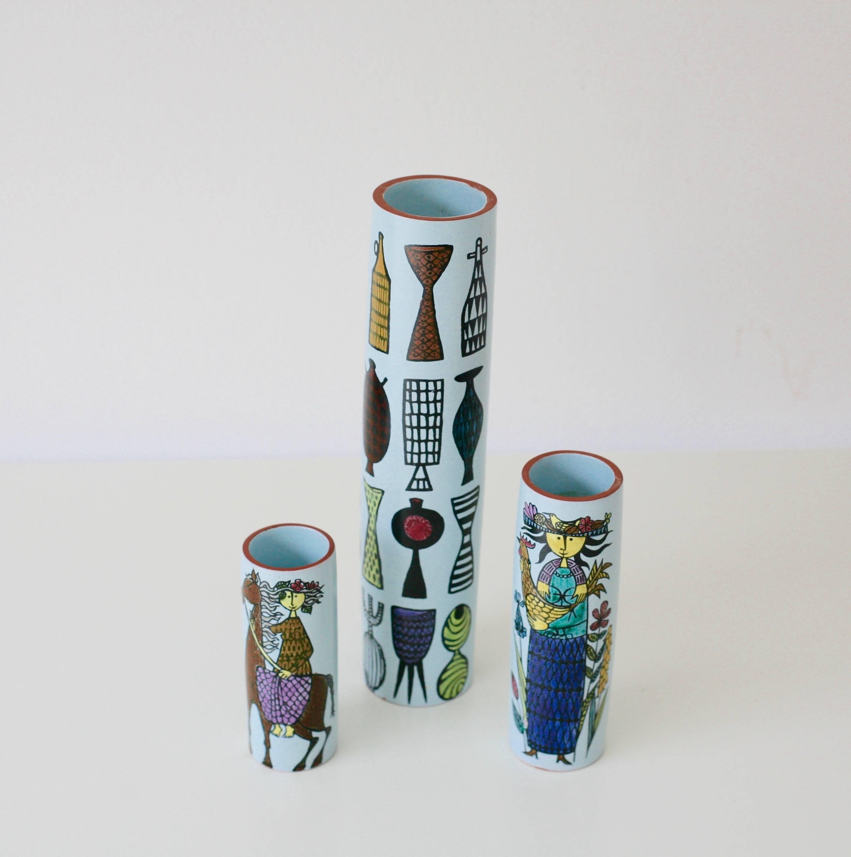 A set of three faience vases in the Karneval series designed by Stig Lindberg for Gustavsberg, Sweden. In production between 1958-1962.