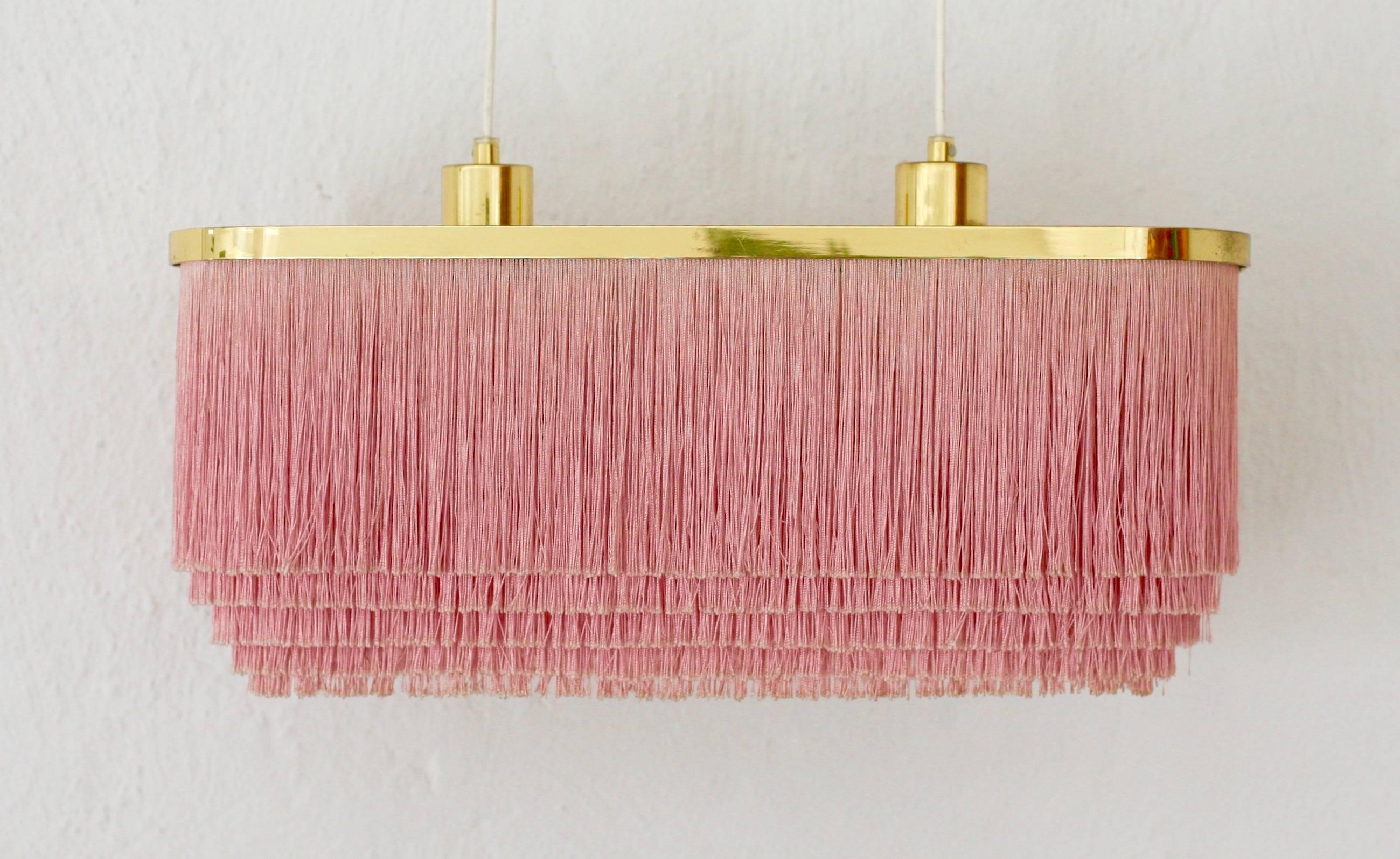 A rare double pink silk fringe lamp by Swedish designer Hans Agne Jakobsson. Model T 607. Great original condition with all parts remaining including ceiling CAP and lock screw. Measures given is for lamp only since electrical cord can be adjusted.