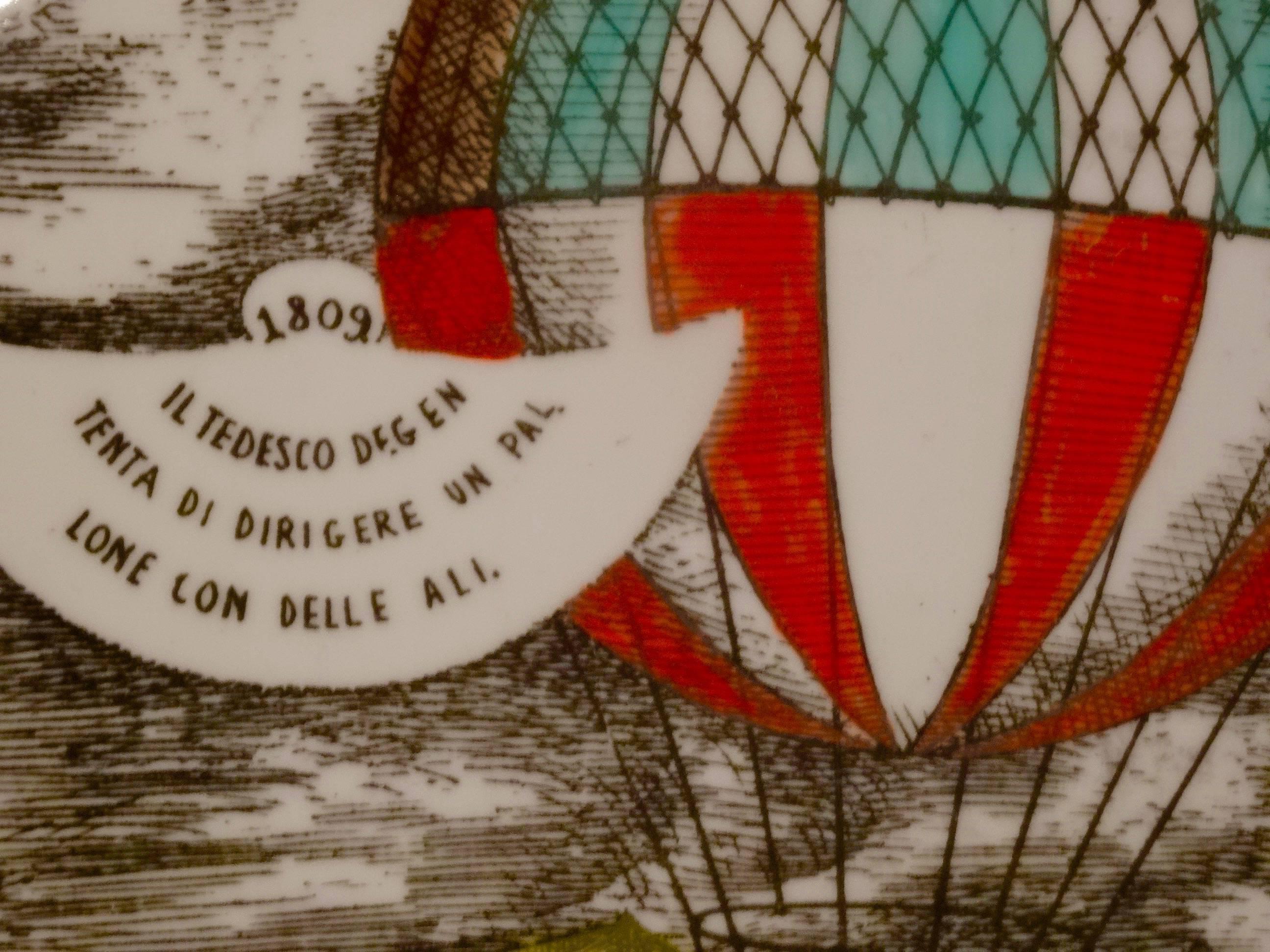 The Mongolfiere (Hot air ballon) plates where designed in 1955 by Piero Fornasetti and came as a numbered set of 12. 