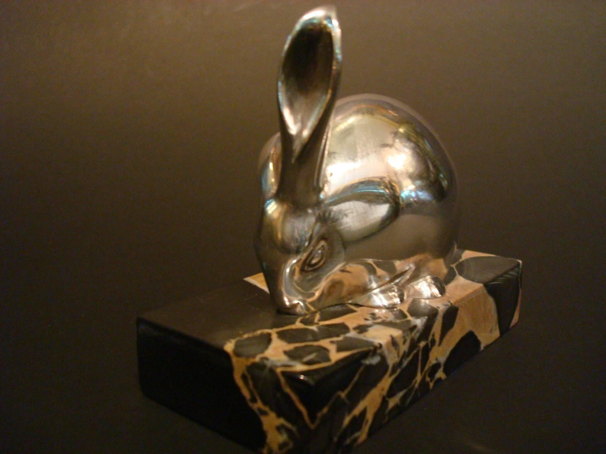 Art Deco silver plated bronze sculpture of a rabbit mounted over a marble base. Lovely paperweight. Edouard Marcel Sandoz (1881-1973).
Signature/ Marks:  Ed.M. Sandoz -  Susse Frères Ed.