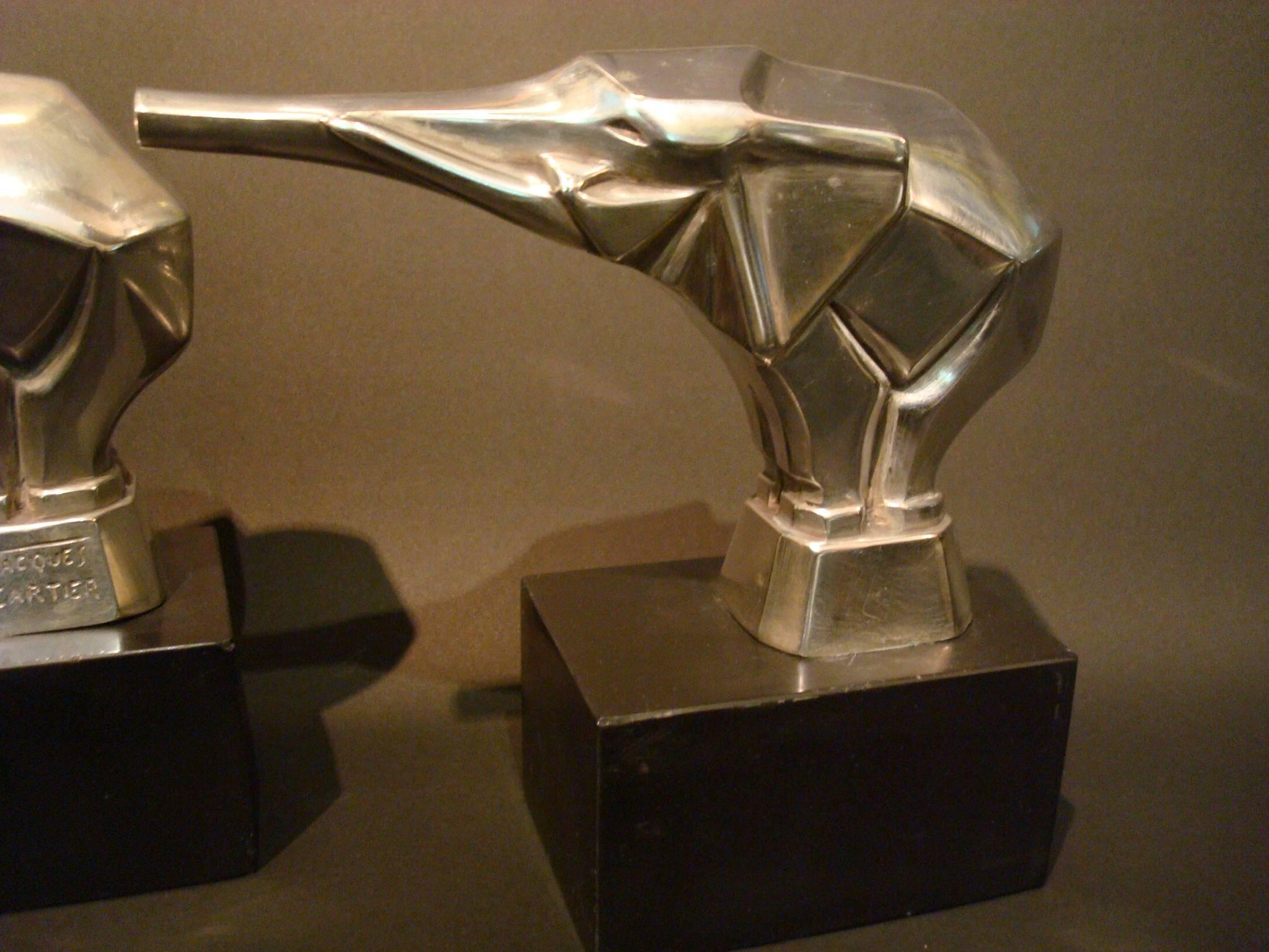 Jacques Cartier exceptional pair of Bookends,  mounted on two marble bases.
Silver plated bronze elephants Marked Jacques Cartier.
Both of the pieces are stamped,
France, circa 1930.
Beautiful, silvered bronze, cubist sculpture of an elephant.