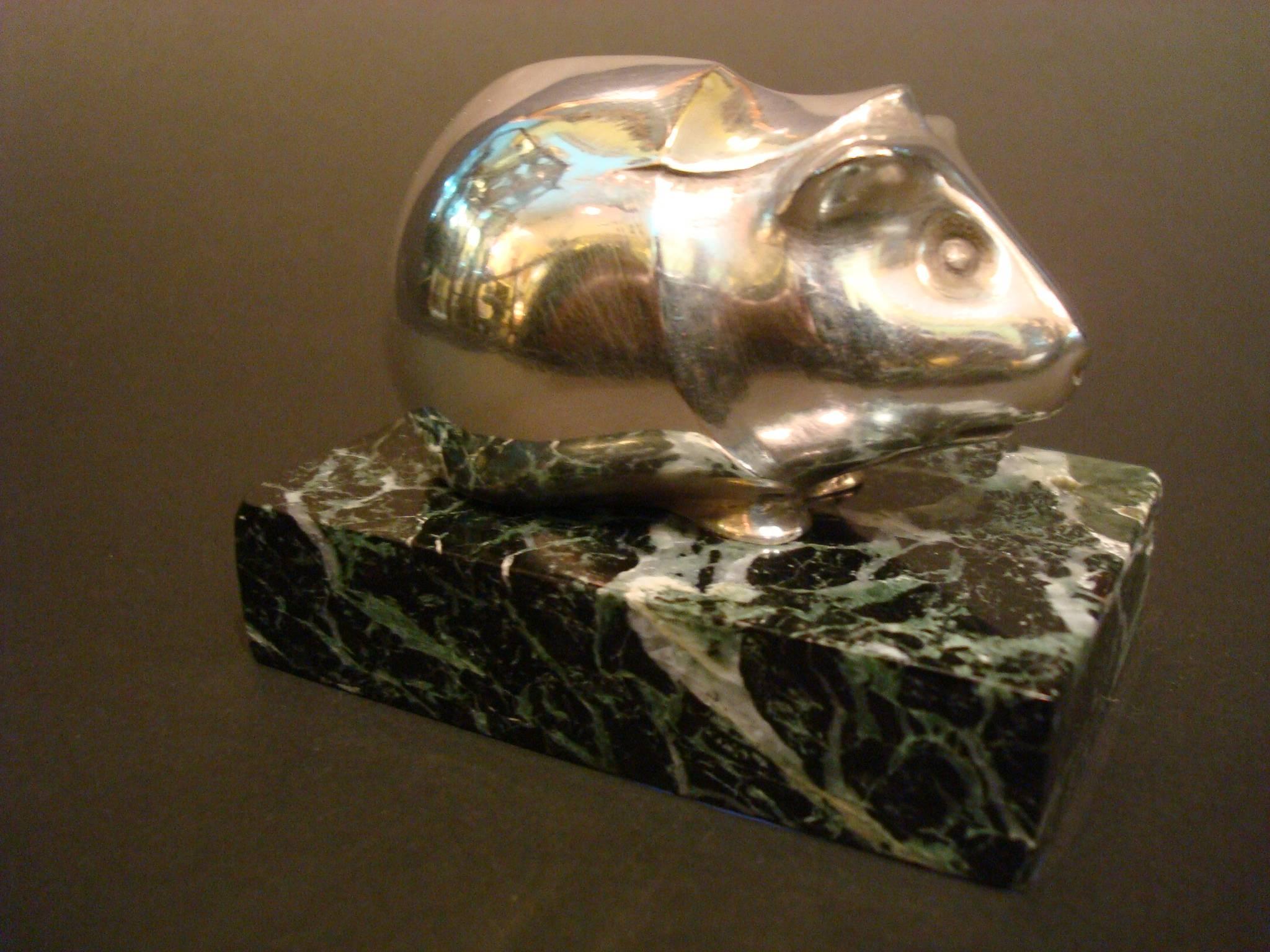 Edouard Marcel Sandoz (Swiss, 1881-1971), Guinea pig Silver plated bronze paperweight. Mounted over a marble base. Marked 