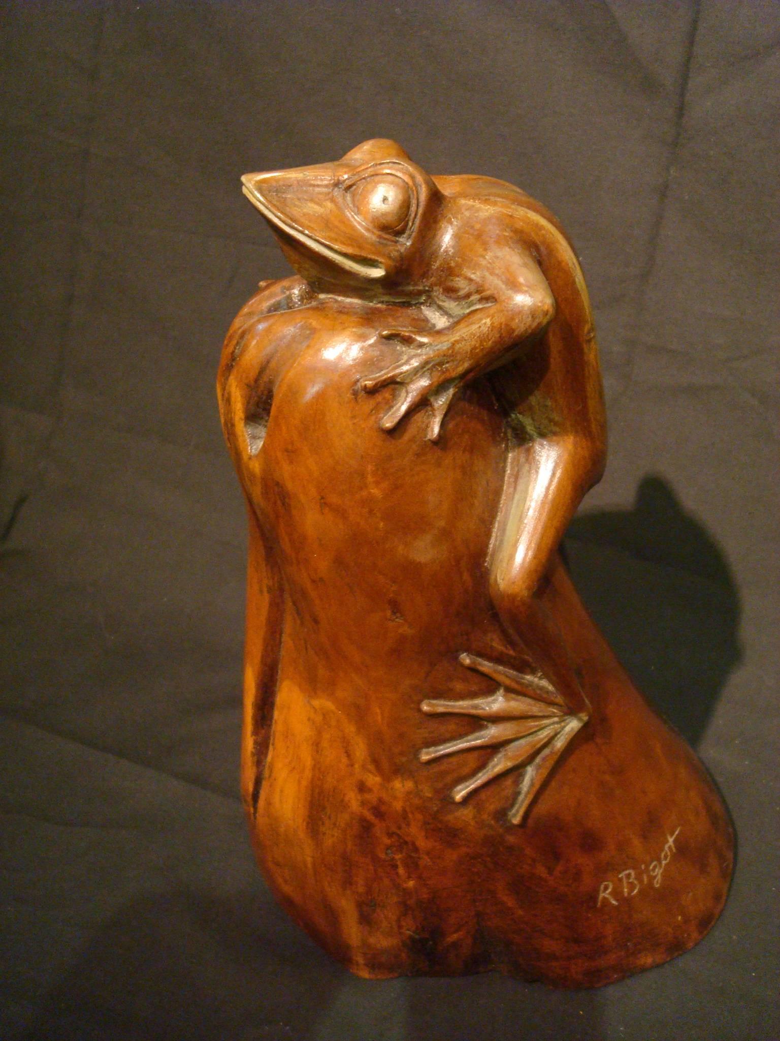 Very nice wooden carved sculpture of a frog over a stone. The frog has a very comic looking. It is signed R. Bigot, and stamped under it made in France,
French, circa 1920.