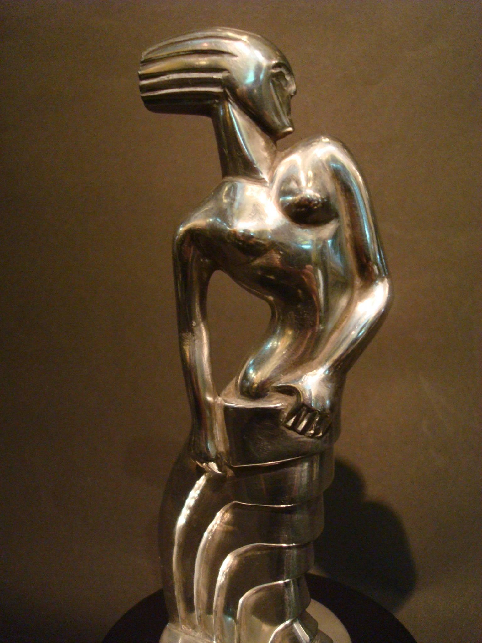 Stylized Art Deco woman.
Rare car mascot – hood ornament. Stylized Art Deco woman, silver-plated bronze, marble base. Signed: S. Rueff (France 1896-1978). mounted on a custom ebonized base. This model was created for the 