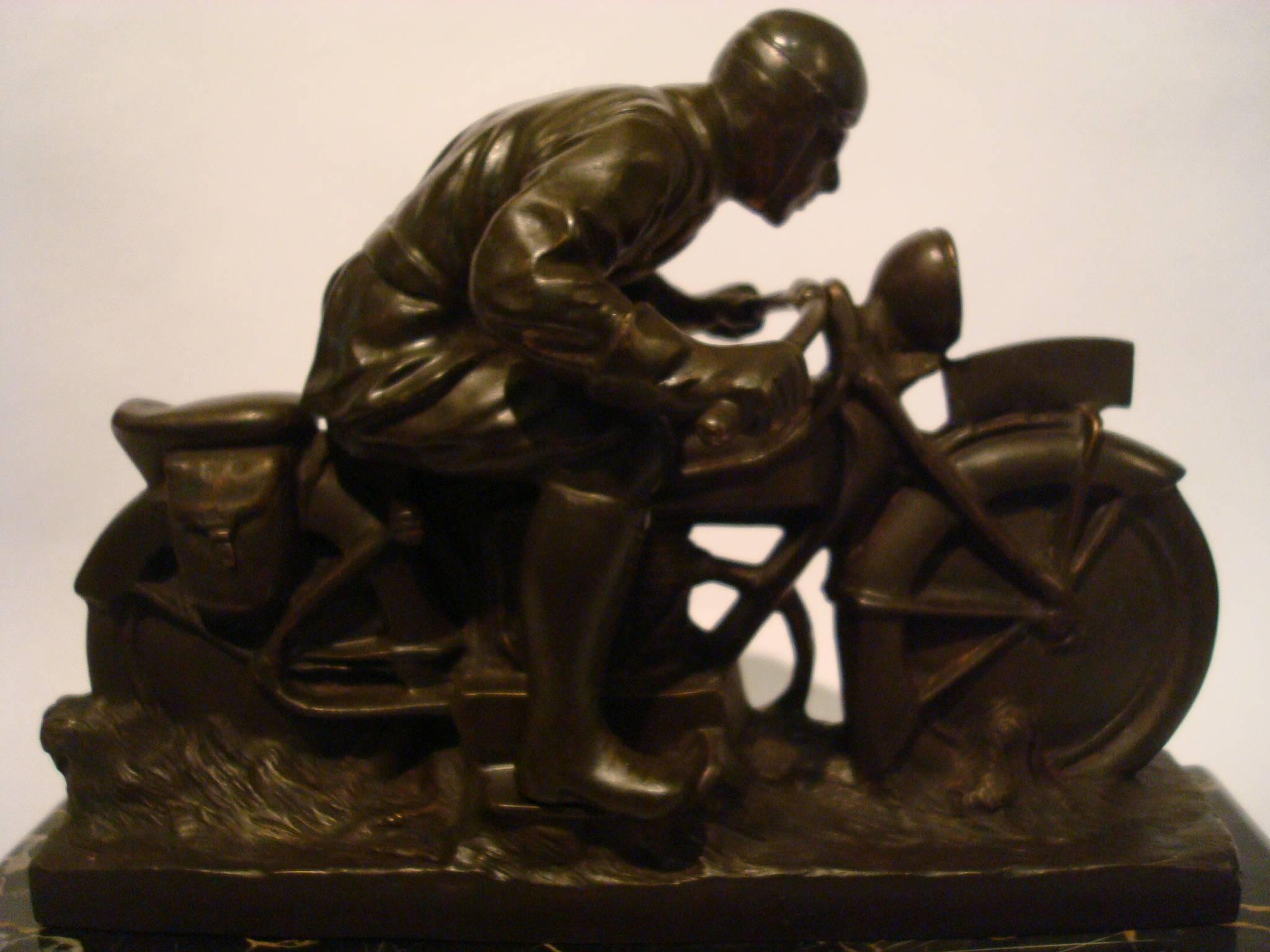 Fantastic detailed motorcycle bronze desk piece. Very nice Automobilia sculpture. Figure with brown patina. Mounted over a Portoro Italian marble. Perfect gift for a Harley Fan!